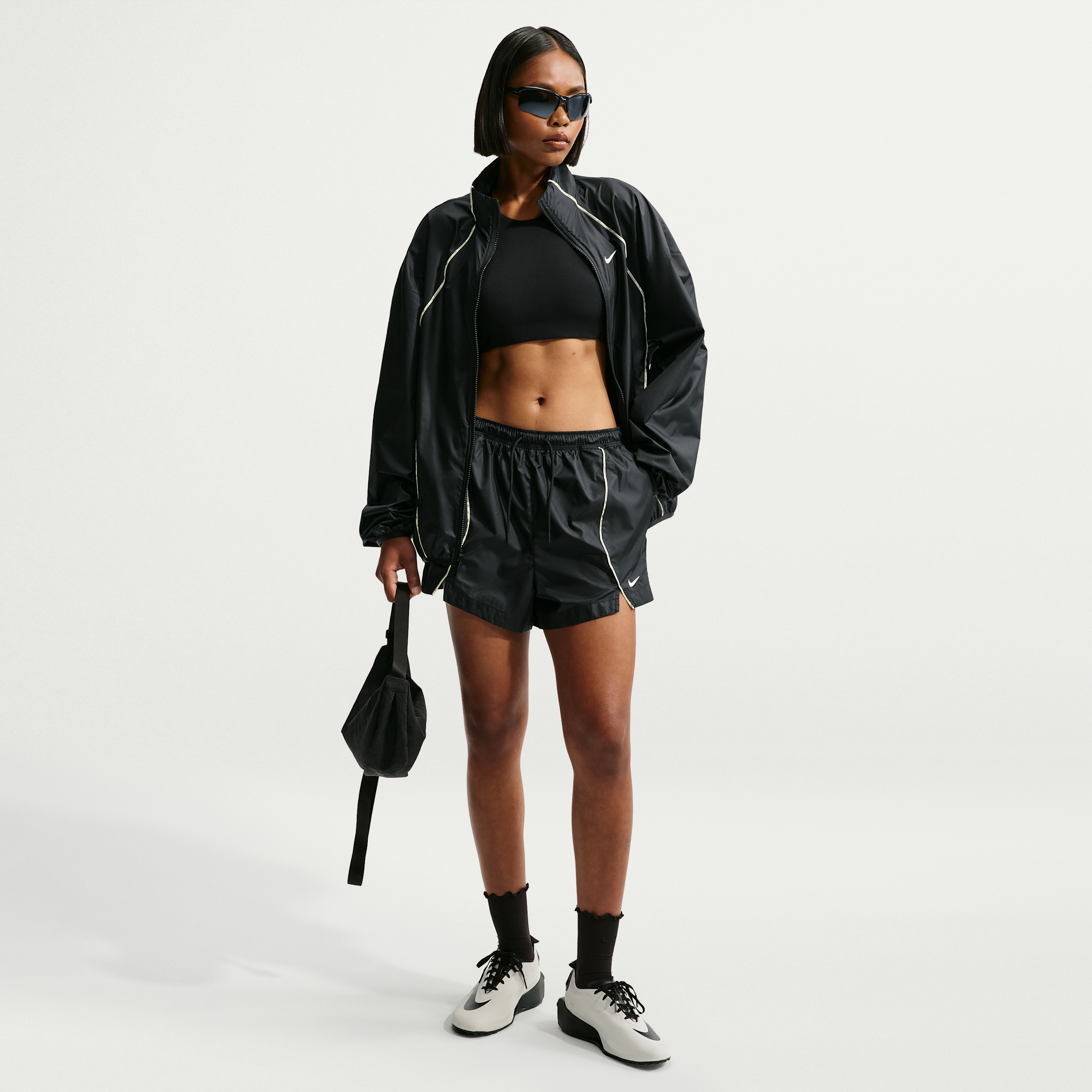 Women's Nike Sportswear Loose Mid-Rise Repel Woven Shorts in Black | IQ3871-010