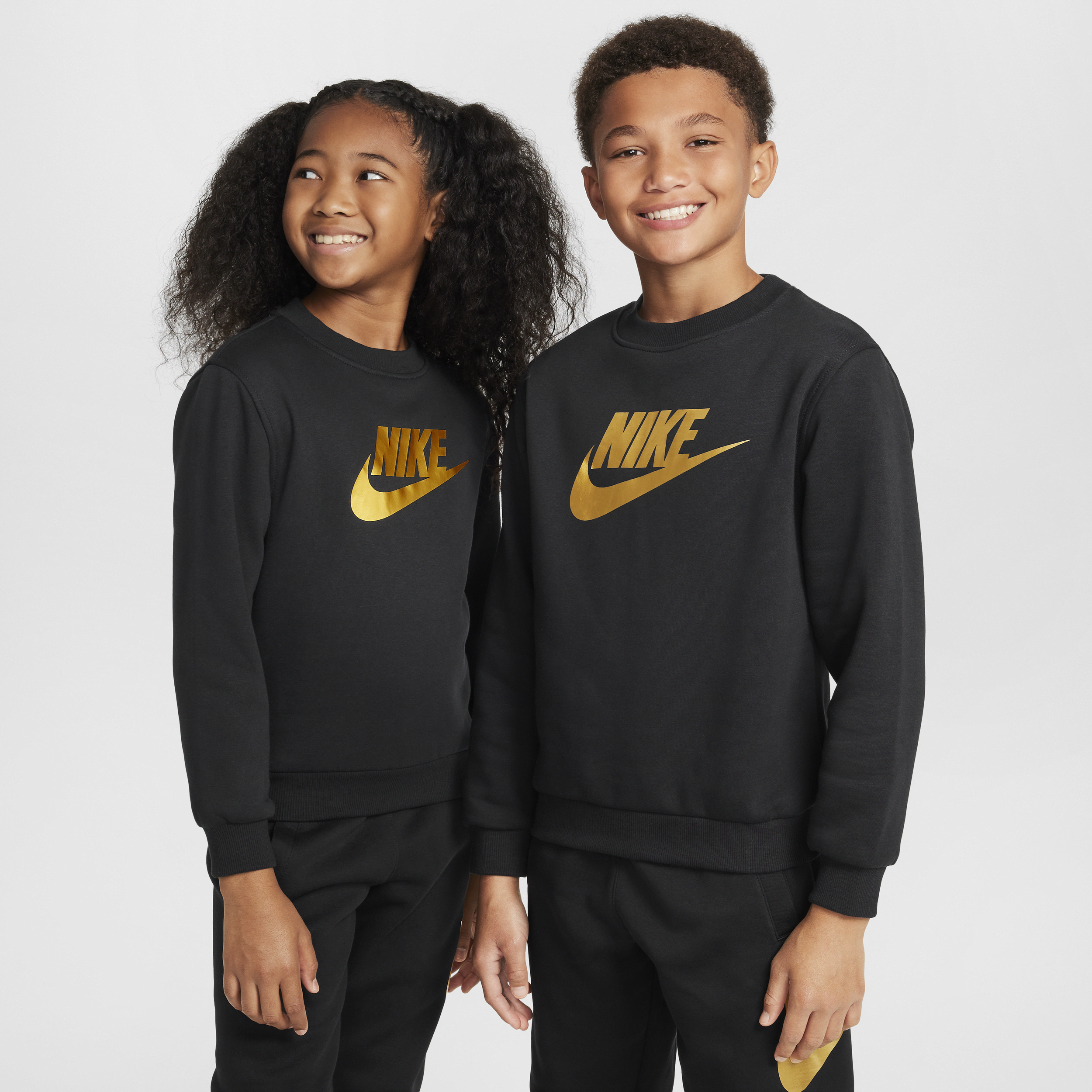 Nike Sportswear Club Fleece Big Kids' Crew-Neck Sweatshirt in Black | HQ0975-010