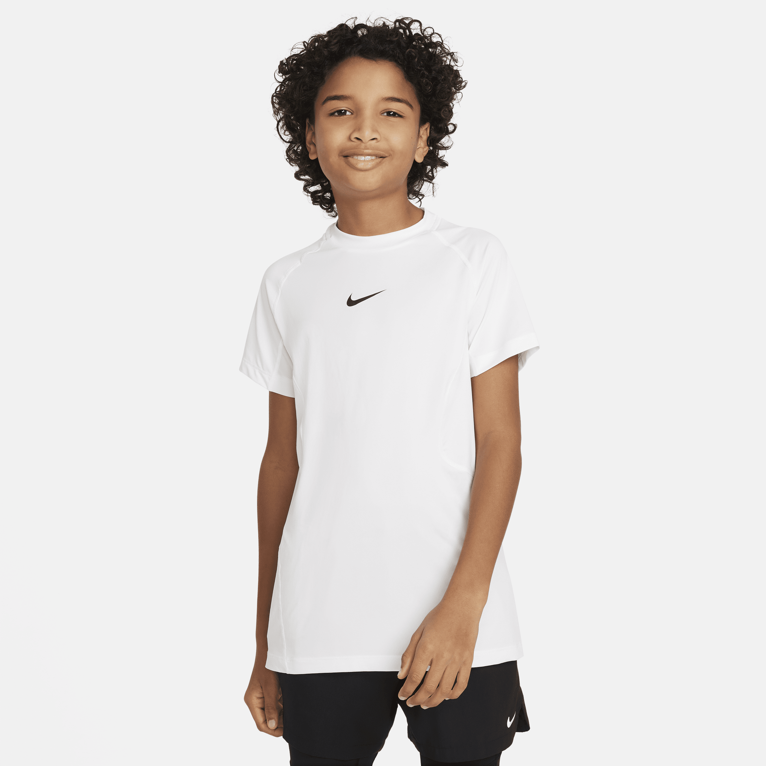 Shop Nike Pro Big Kids' (boys') Dri-fit Short-sleeve Top In White