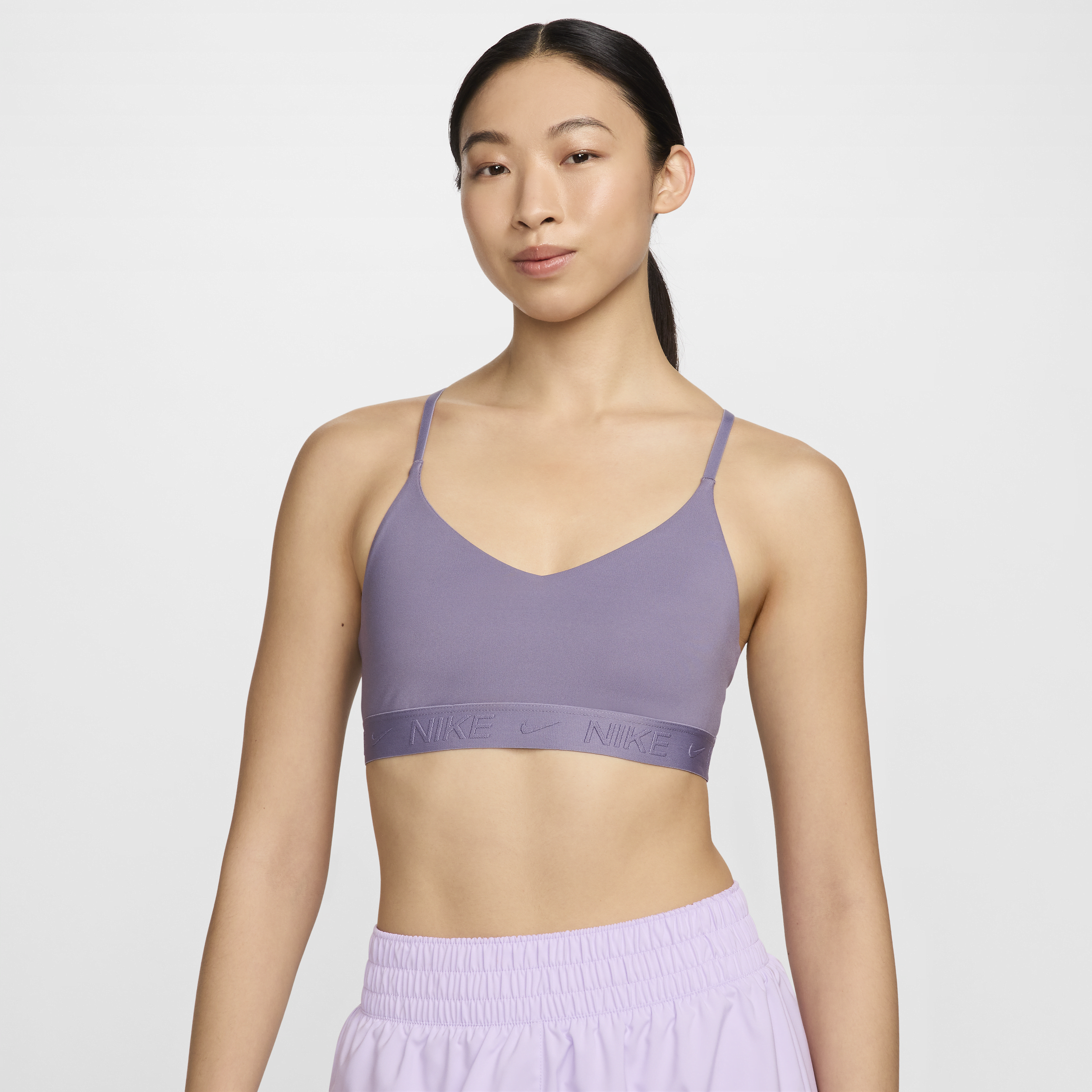 Shop Nike Women's Indy Light Support Padded Adjustable Sports Bra In Purple