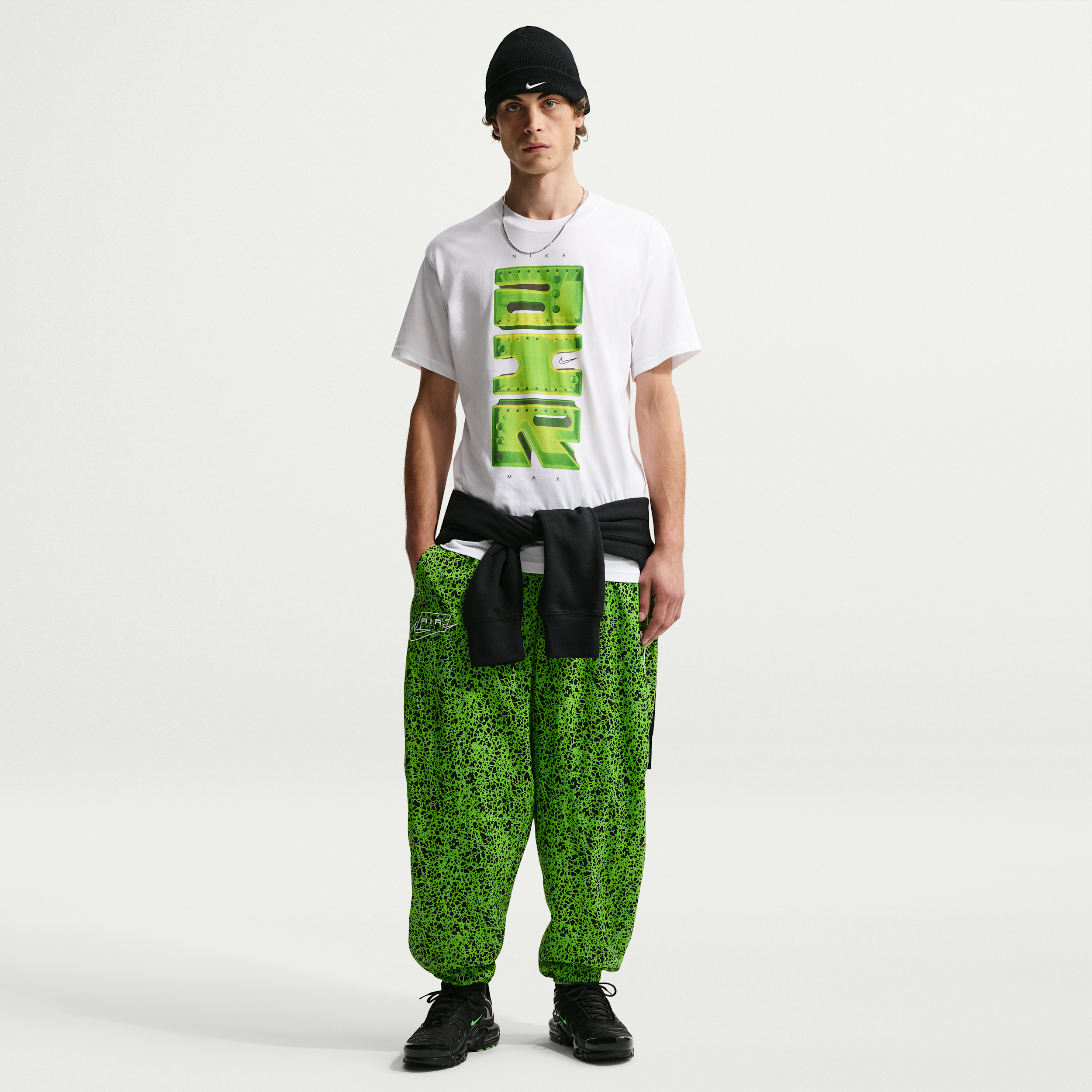 Nike Men's Air Woven Pants in Green | II3133-307
