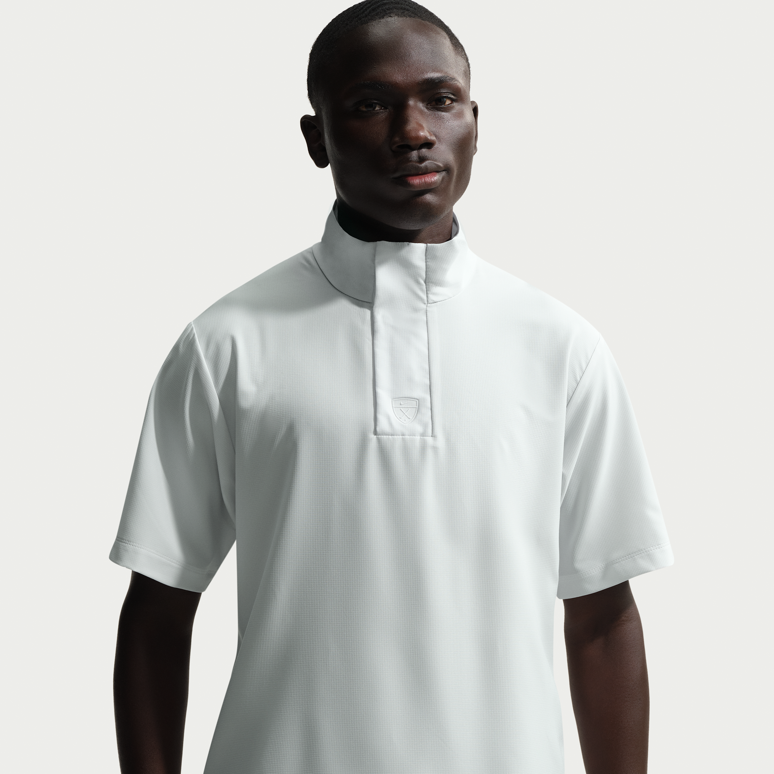 Nike Men's Tailored Performance Dri-FIT Loose Short-Sleeve Golf Windshirt in Grey | IM8625-025