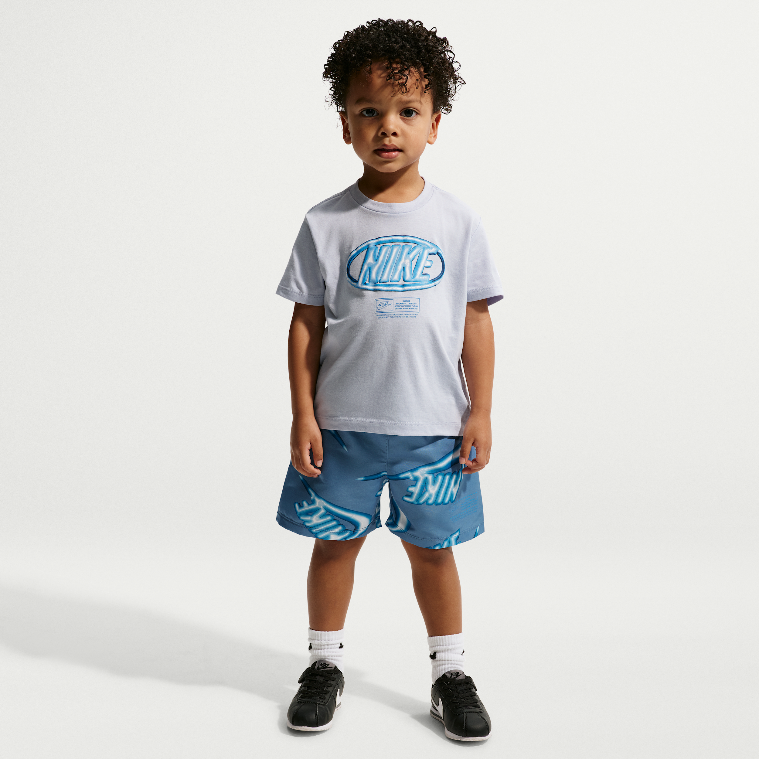 Nike Sportswear Club Toddler 2-Piece Floatie T-Shirt and Shorts Set in Blue | 76N878-U1T