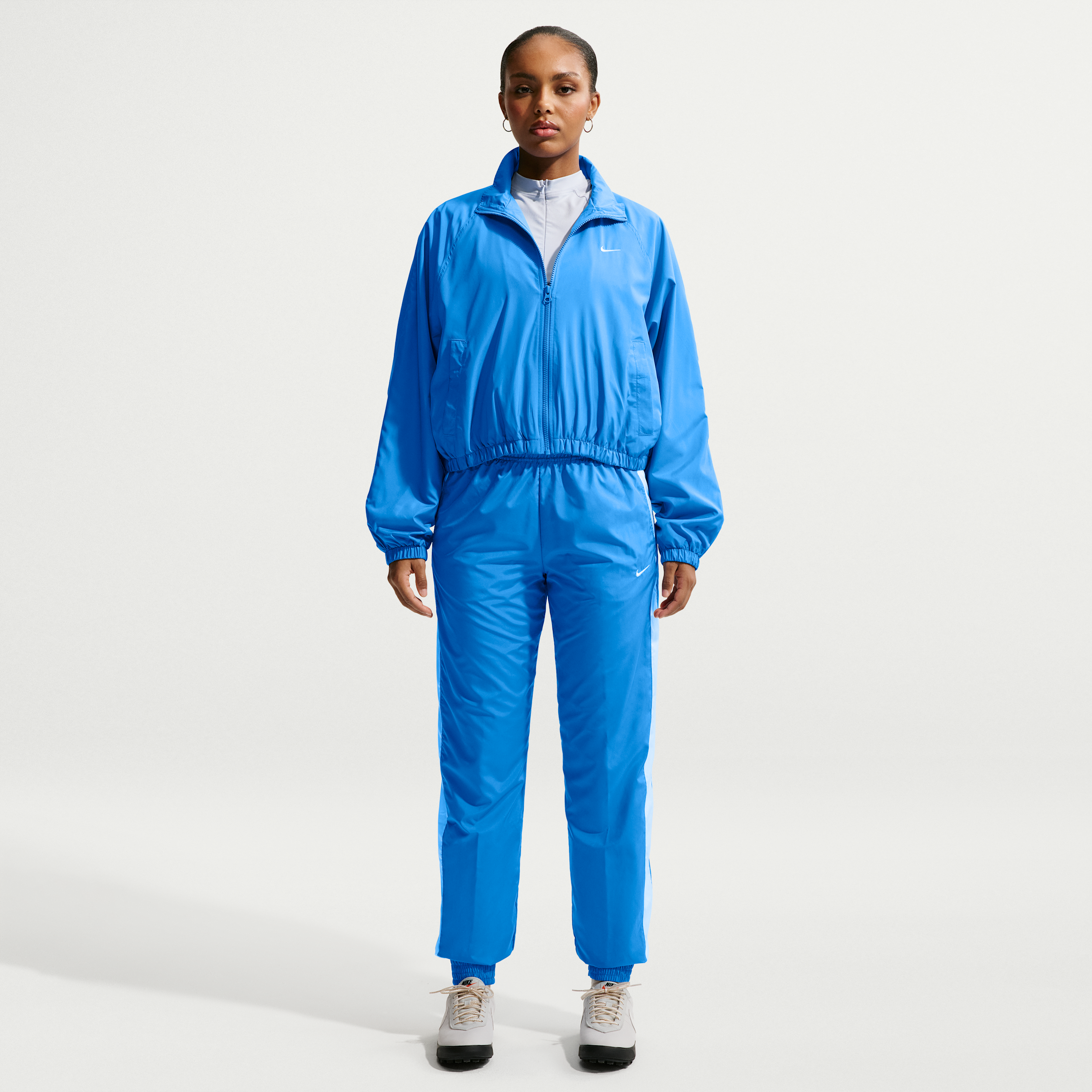Women's Nike Sportswear Classic Wovens UV Protection Mid-Rise Loose Jogger Pants in Blue | FV7660-435