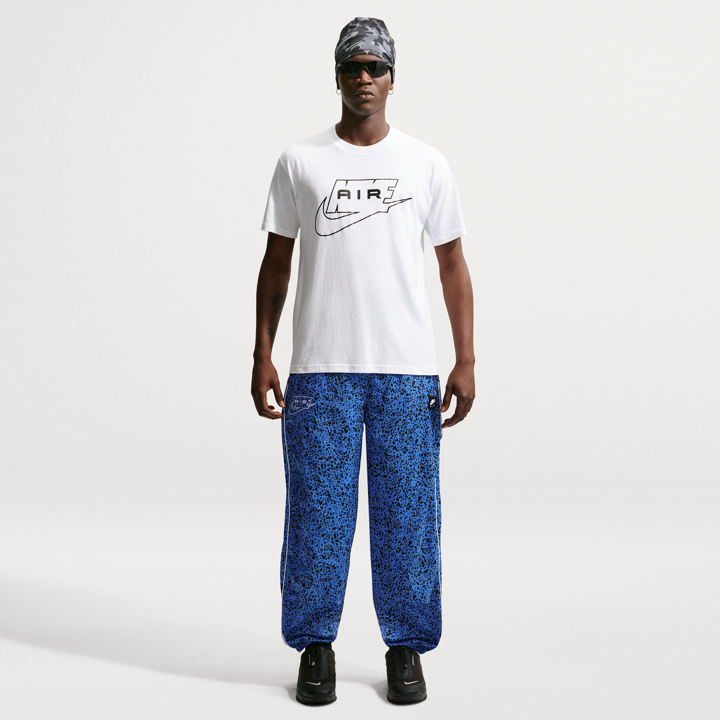 Nike Men's Air Woven Pants in Blue | II3133-452