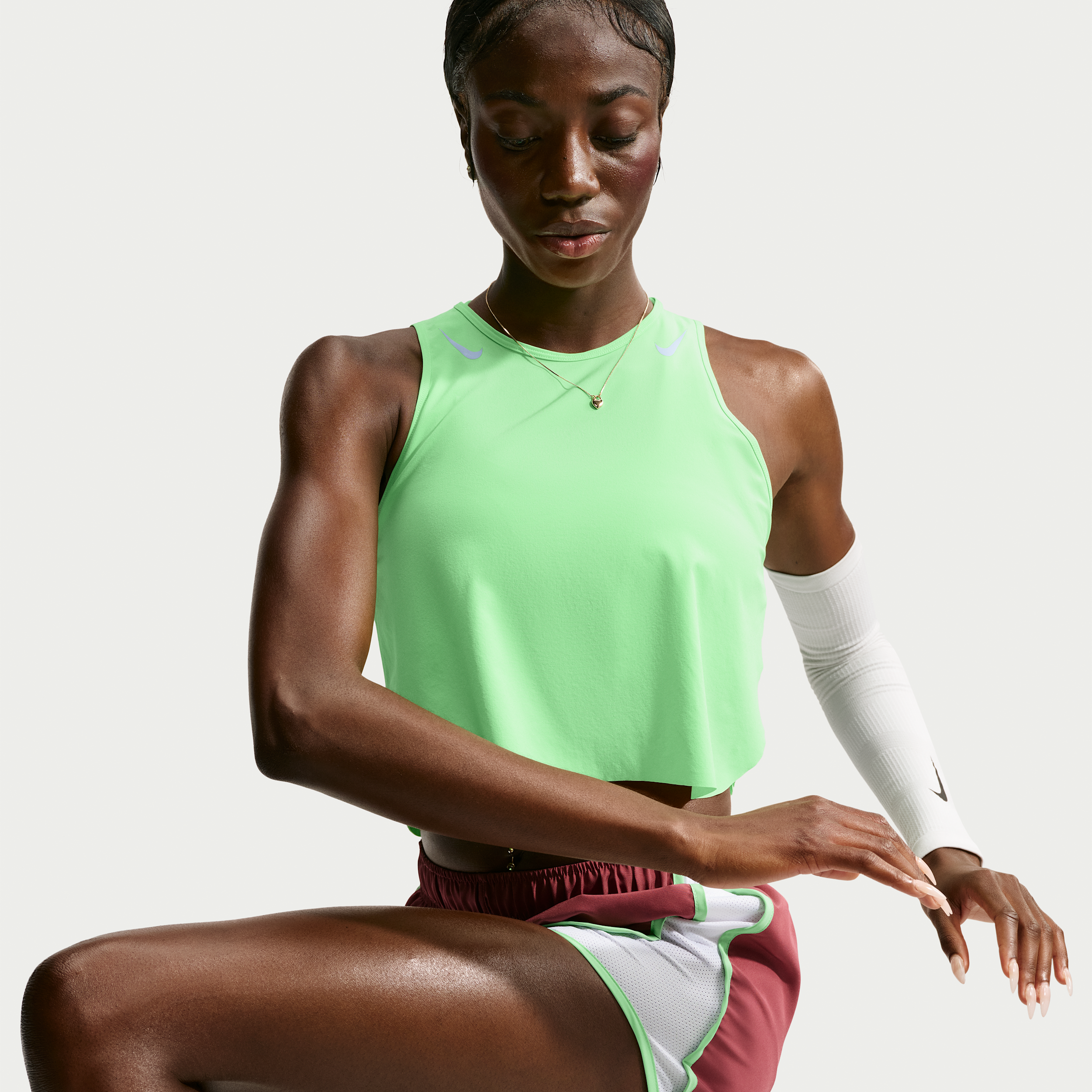 Nike Women's AeroSwift Dri-FIT ADV Cropped Running Tank Top, Large, Illusion Green/Aluminum