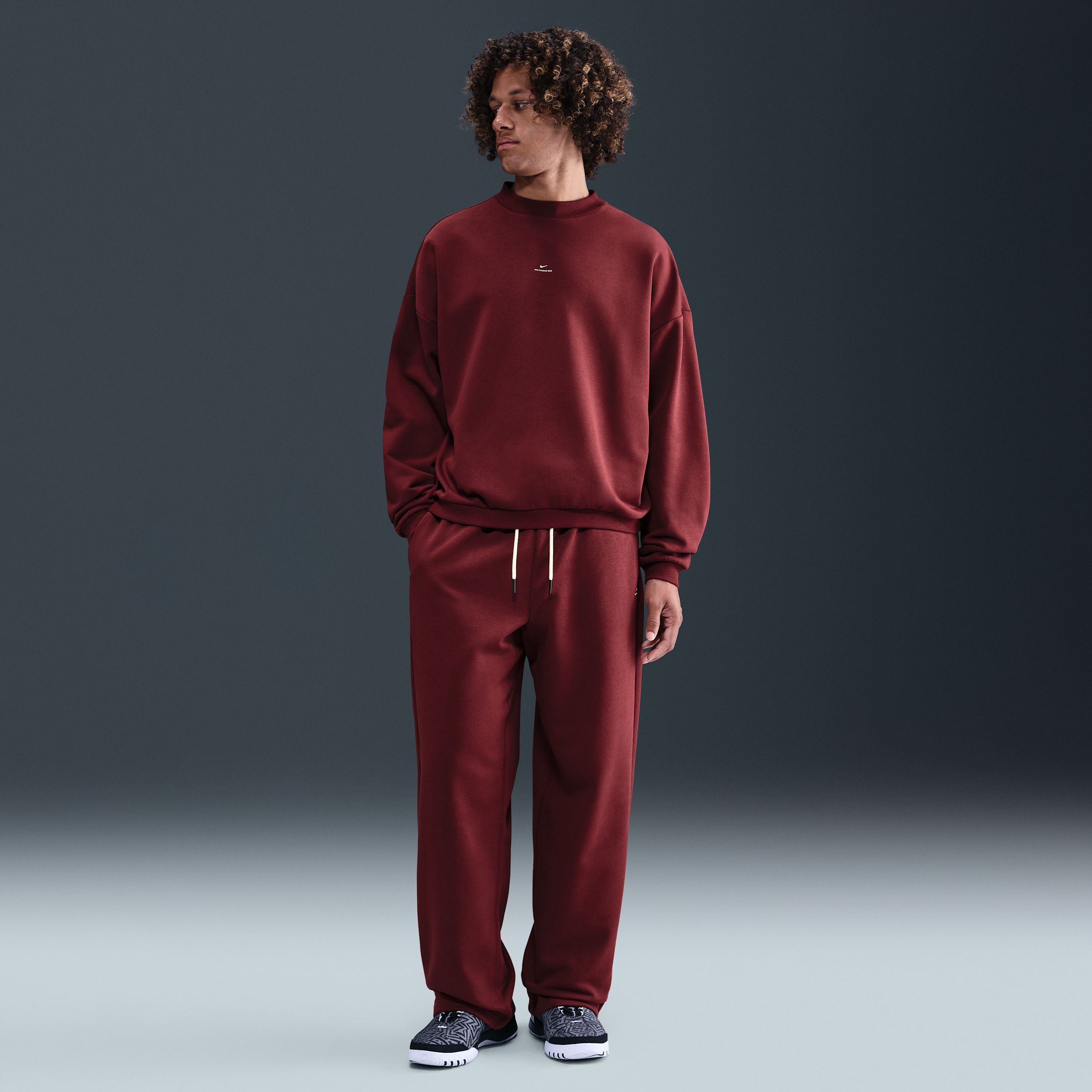 Nike Men's Standard Issue Therma-FIT Brushed Open-Hem Basketball Pants in Red | IM6333-619