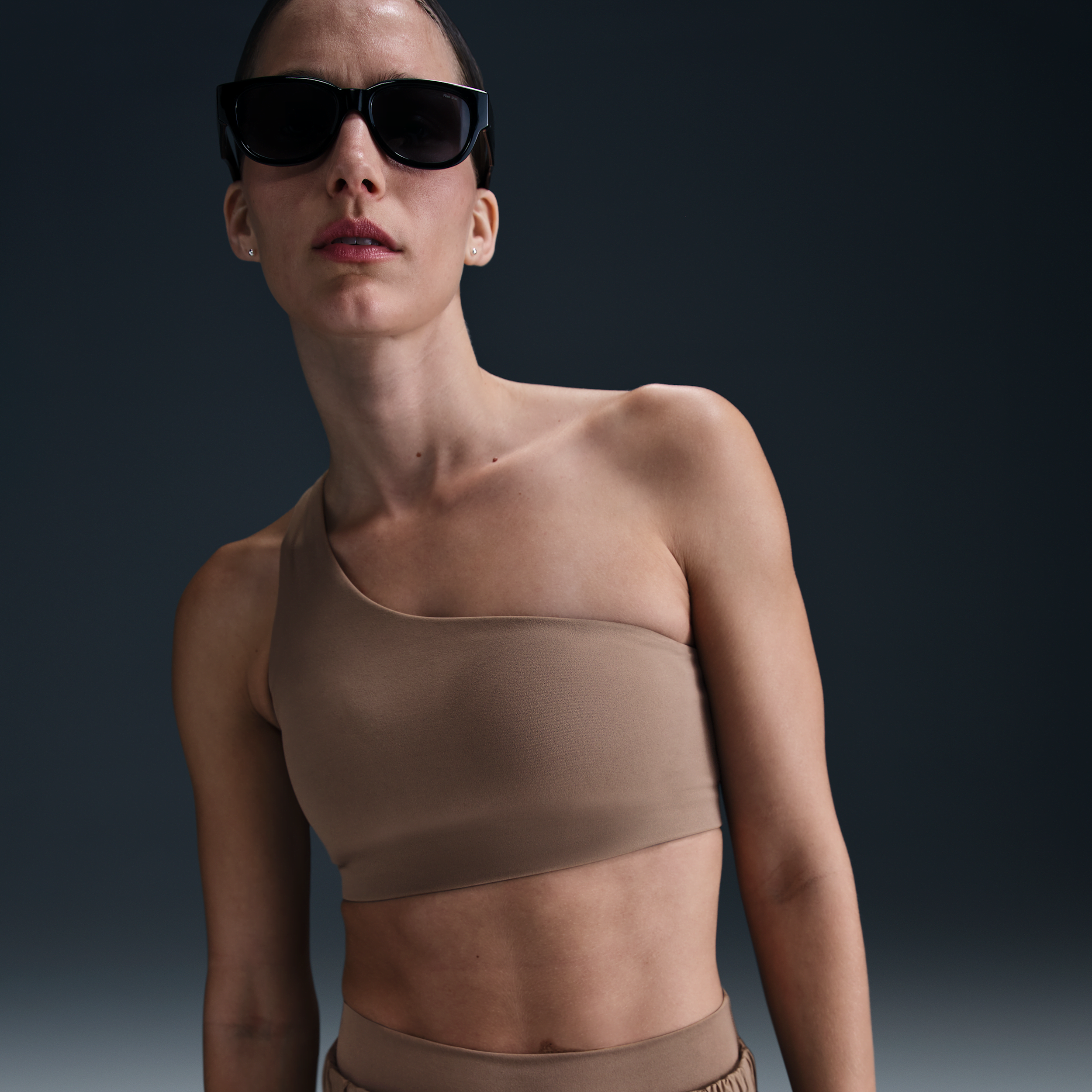 Shop Nike Women's Zenvy Asymmetrical Light-support Padded Sports Bra In Brown