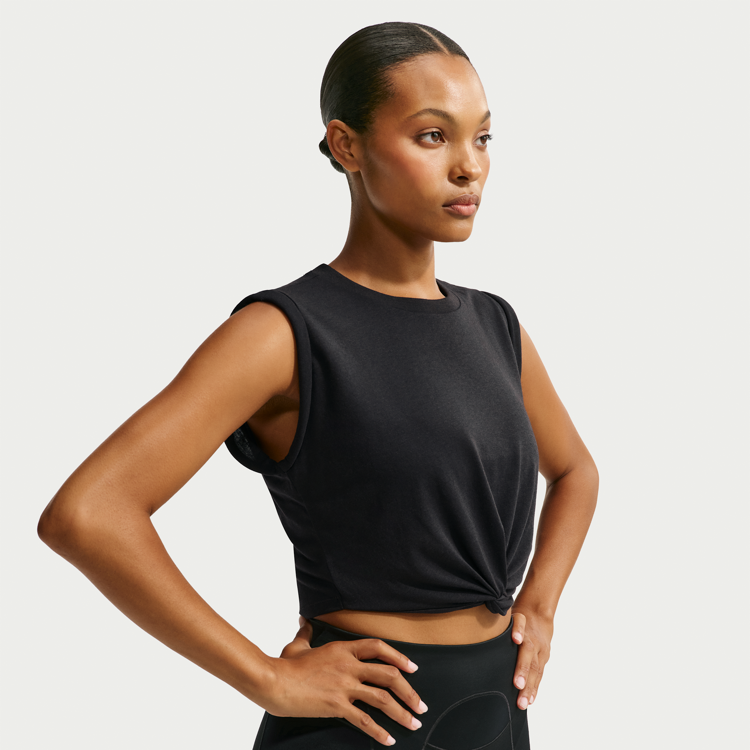 Nike Women's SKIMS Performance Cotton Blend Cropped Twist Tank Top in Black | IV6645-054
