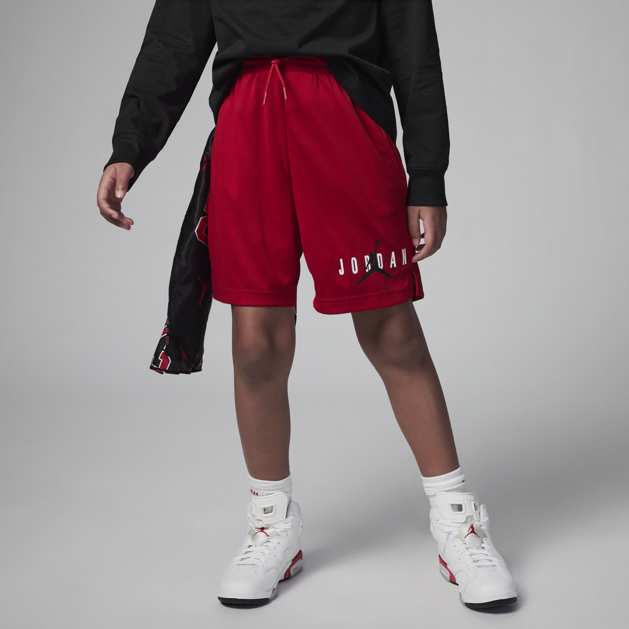 Shop Jordan Essentials Big Kids' Graphic Mesh Shorts In Red
