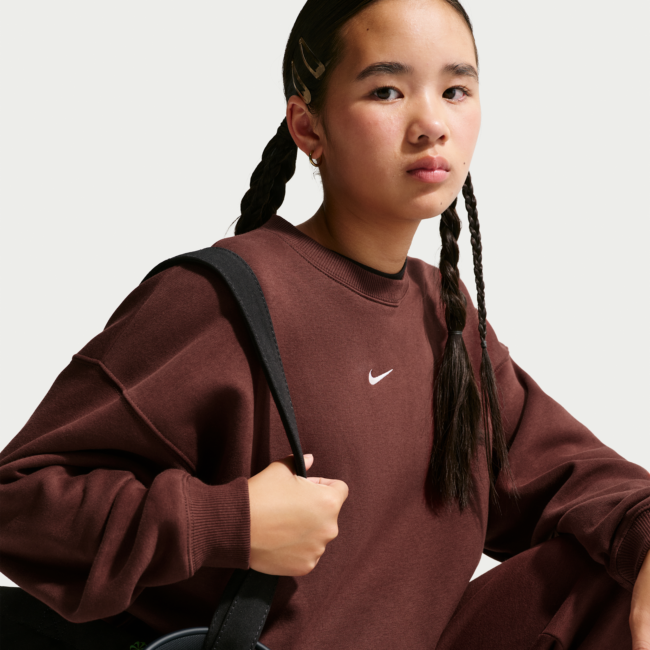Nike Sportswear Studio Big Kids' (Girls') Oversized Crew-Neck Sweatshirt in Purple | IM4947-658