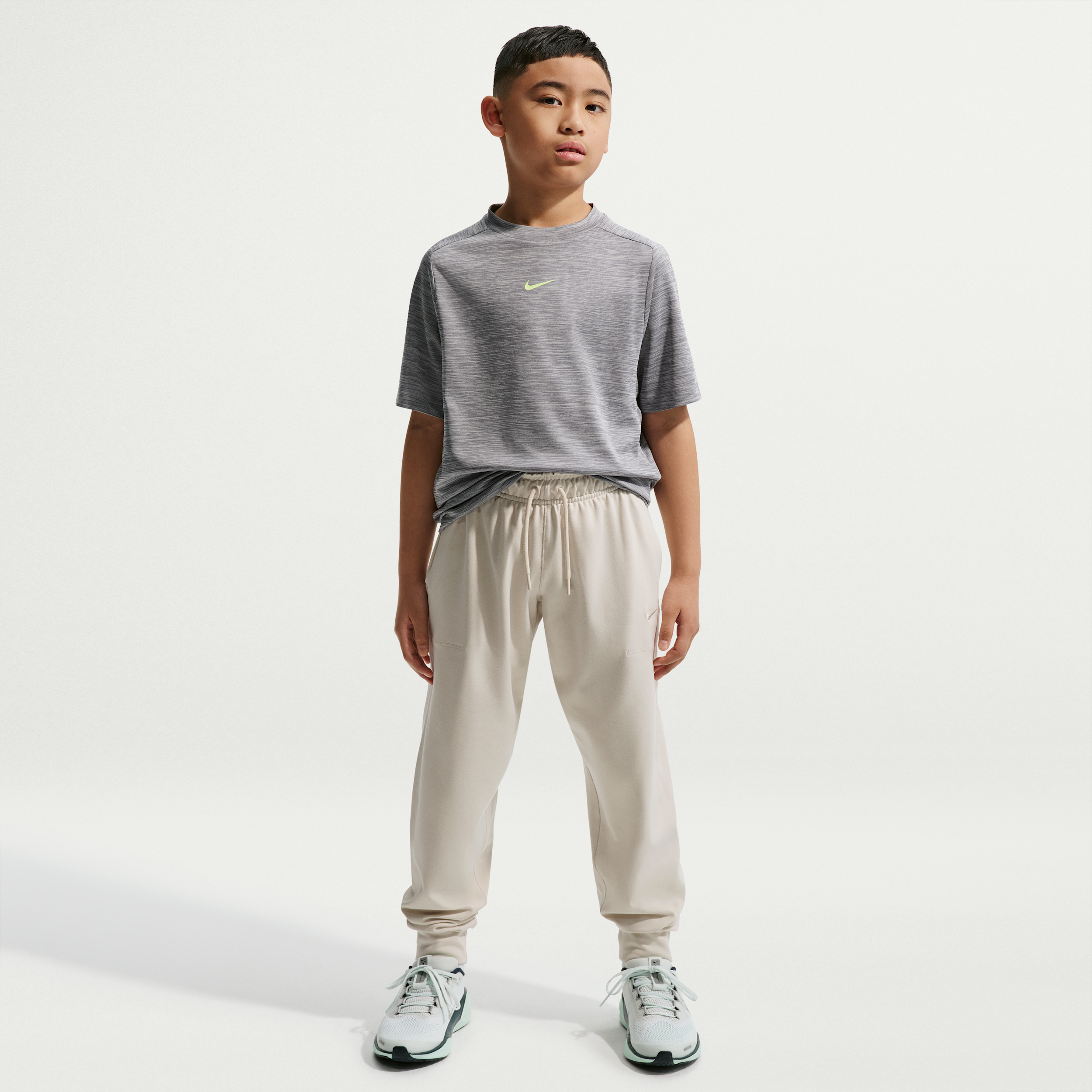 Nike Primary Nano Big Kids' (Boys') Dri-FIT UV Nano Jogger Pants in Brown | IU3118-104
