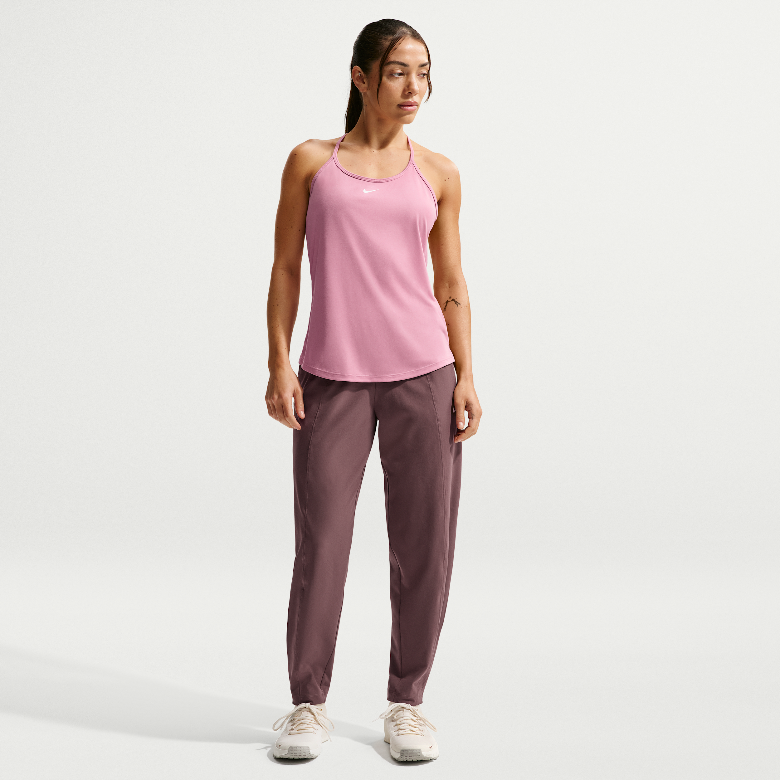 Nike Women's One Dri-FIT Mid-Rise Woven Pants in Purple | IQ0340-502