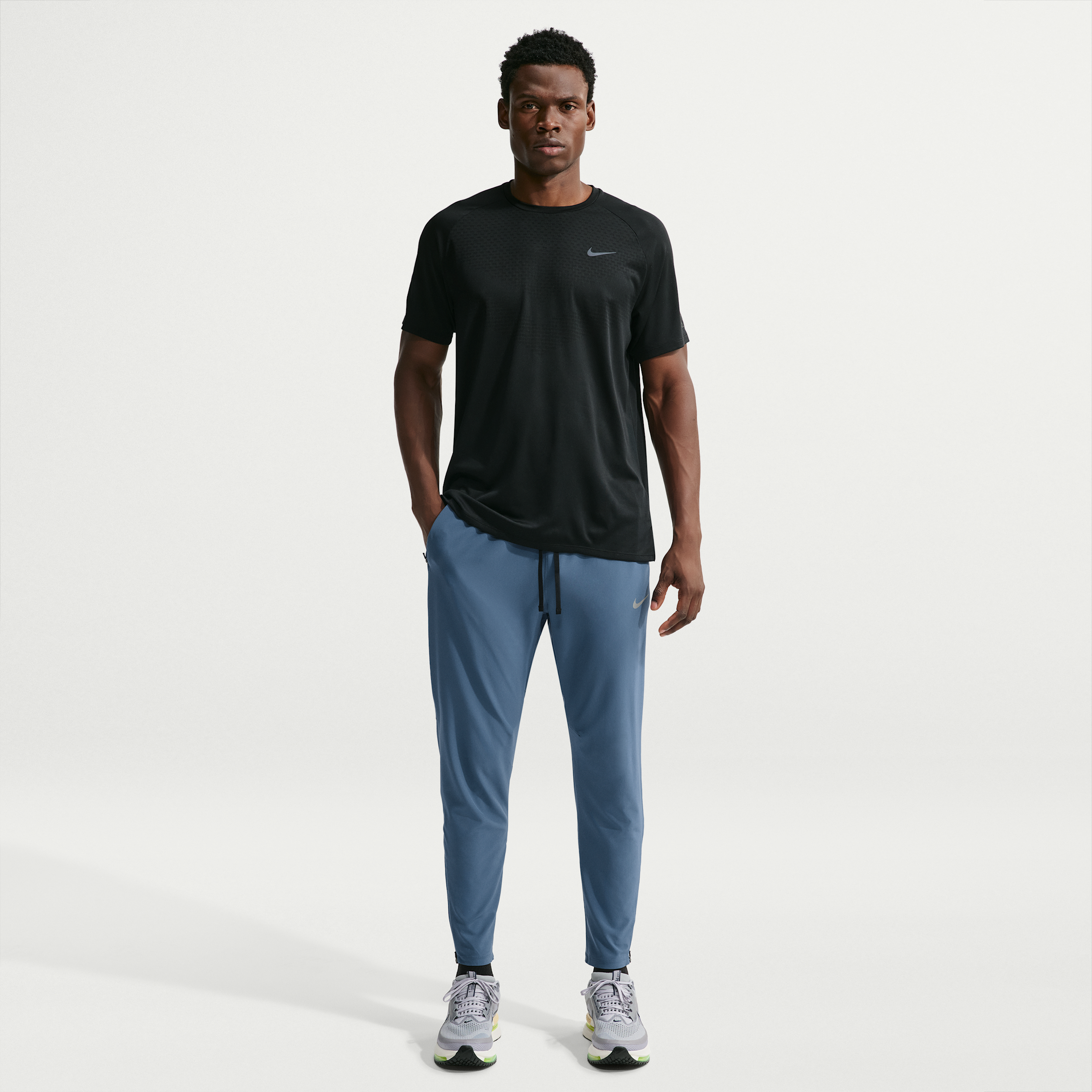 Nike Men's Stride Dri-FIT Woven Running Pants in Blue | HV4544-438