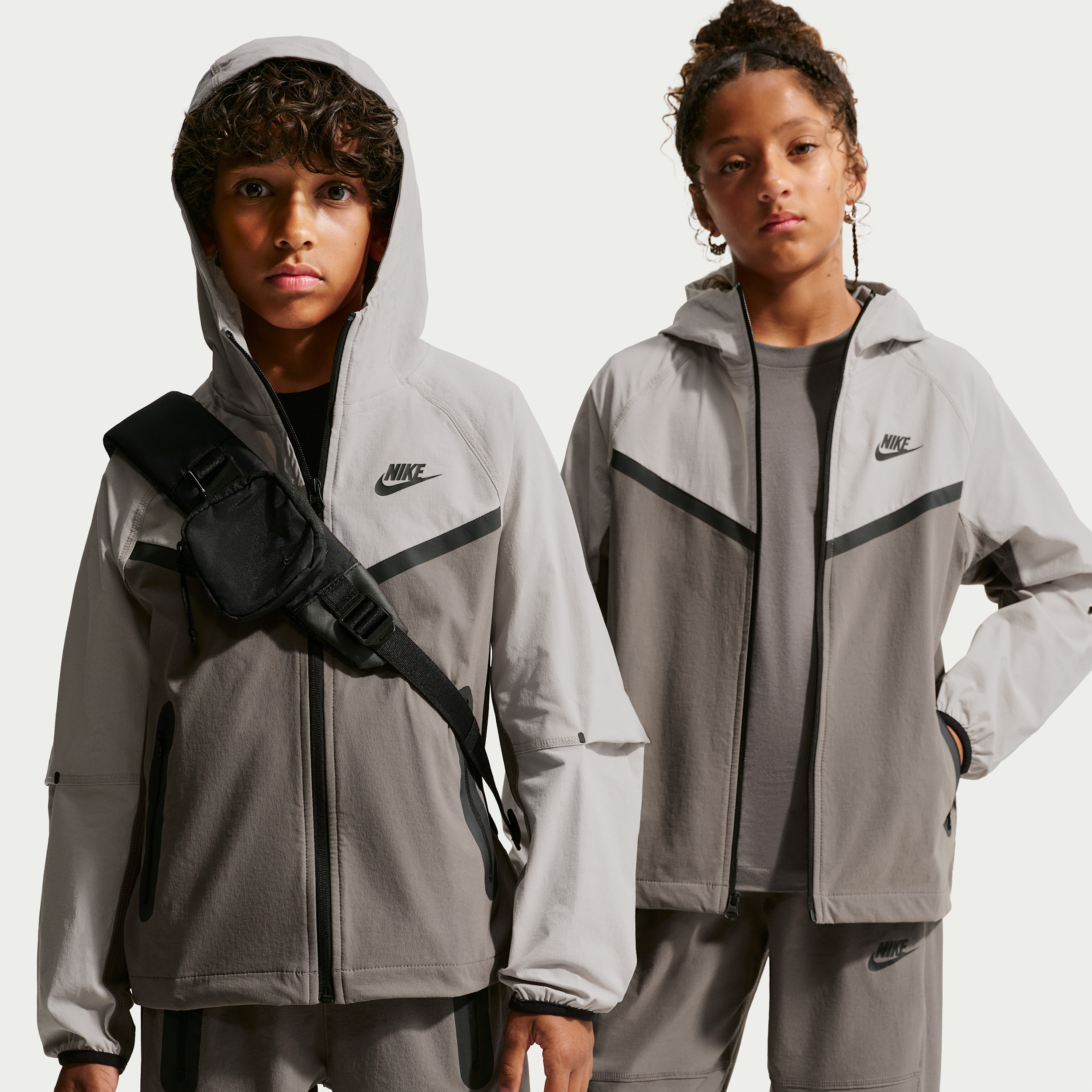 Nike Big Kids Tech Woven Jacket in Cave Stone/Moon Particle/Black Size: Medium