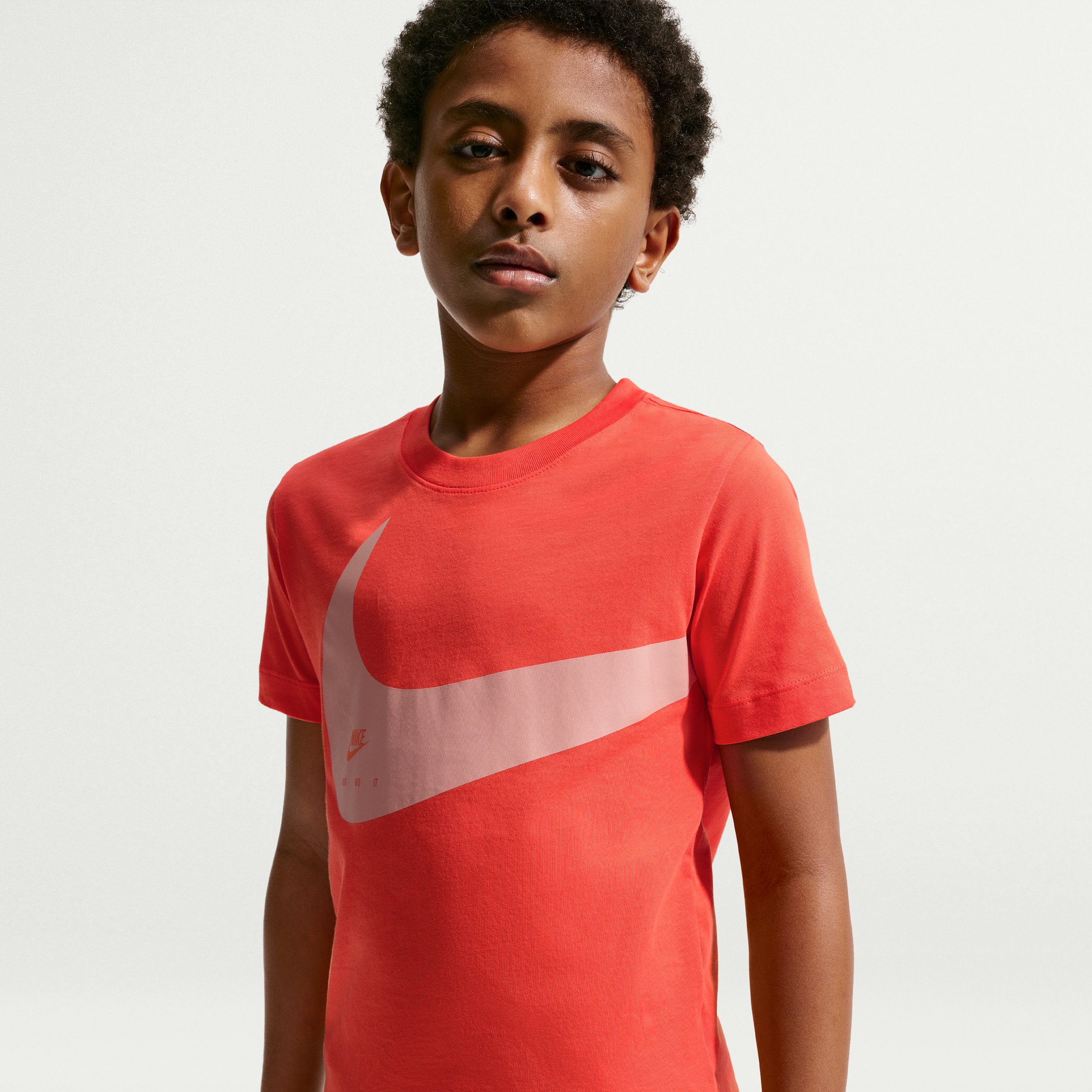 Nike Sportswear Club Big Kids' T-Shirt in Orange | II9943-842