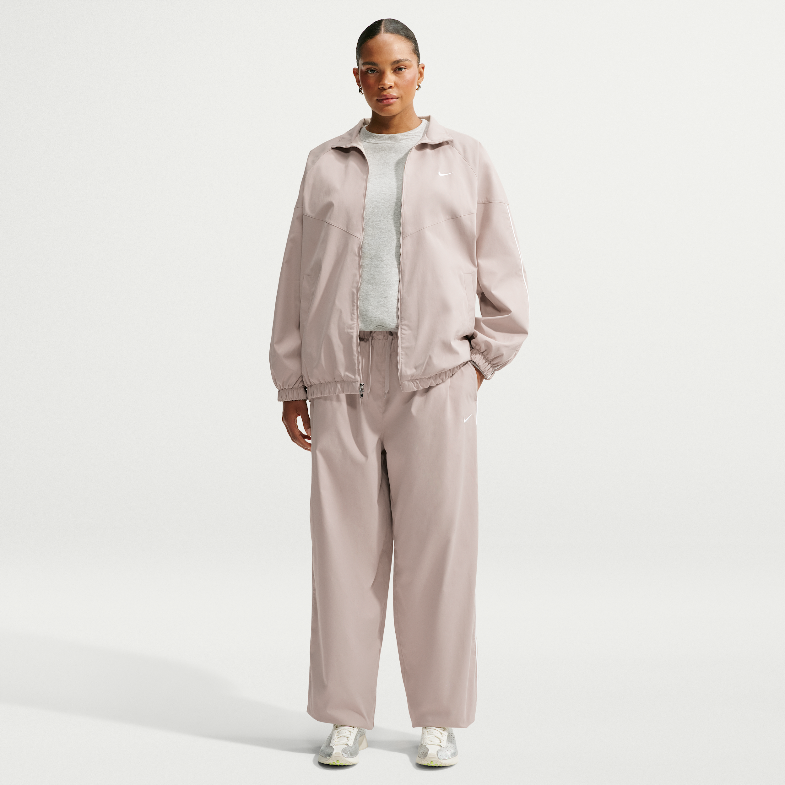 Women's Nike Sportswear Loose High-Waisted Track Pants in Brown | IQ3166-236