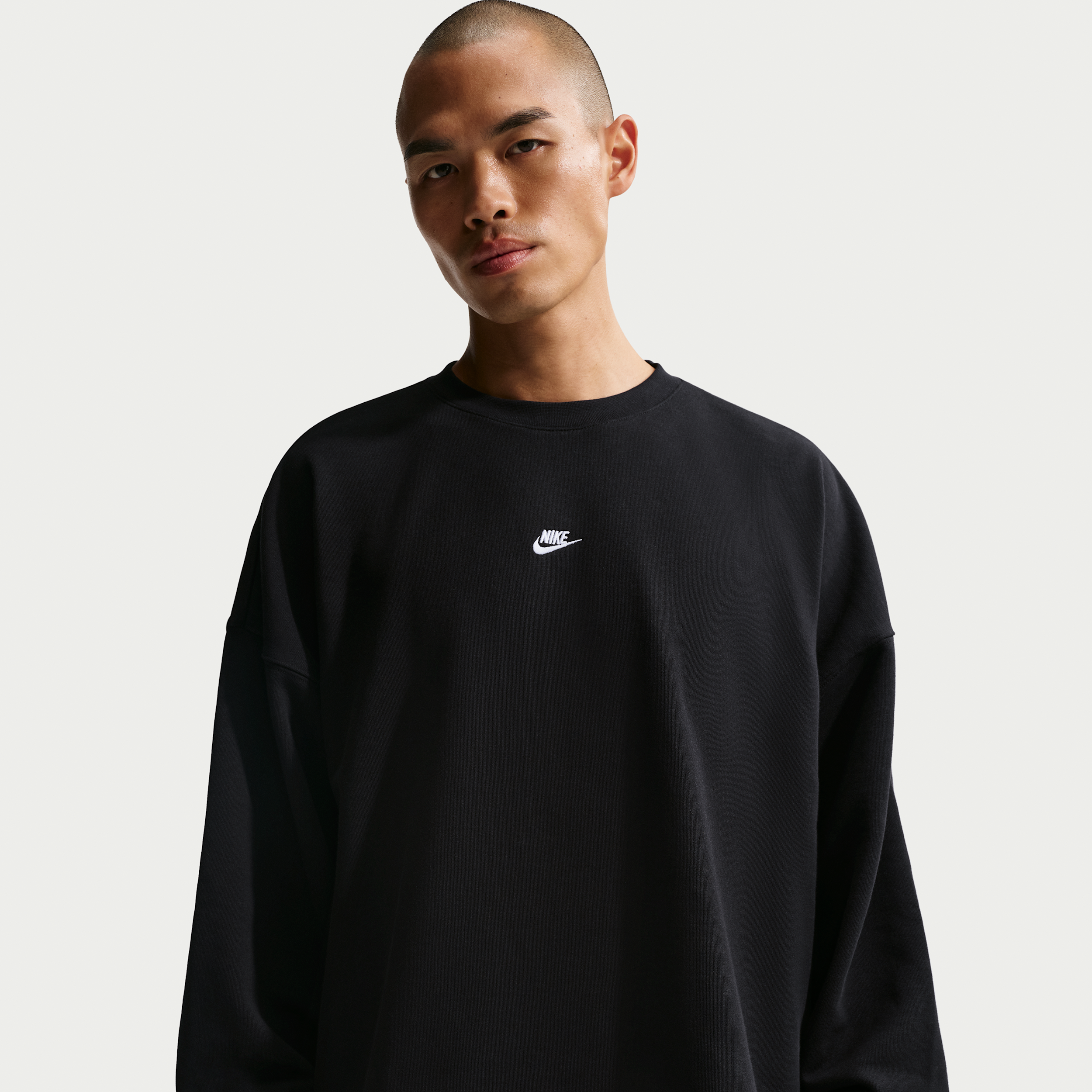 Men's Nike Sportswear Club Oversized French Terry Crew-Neck Sweatshirt in Black | IF0747-010