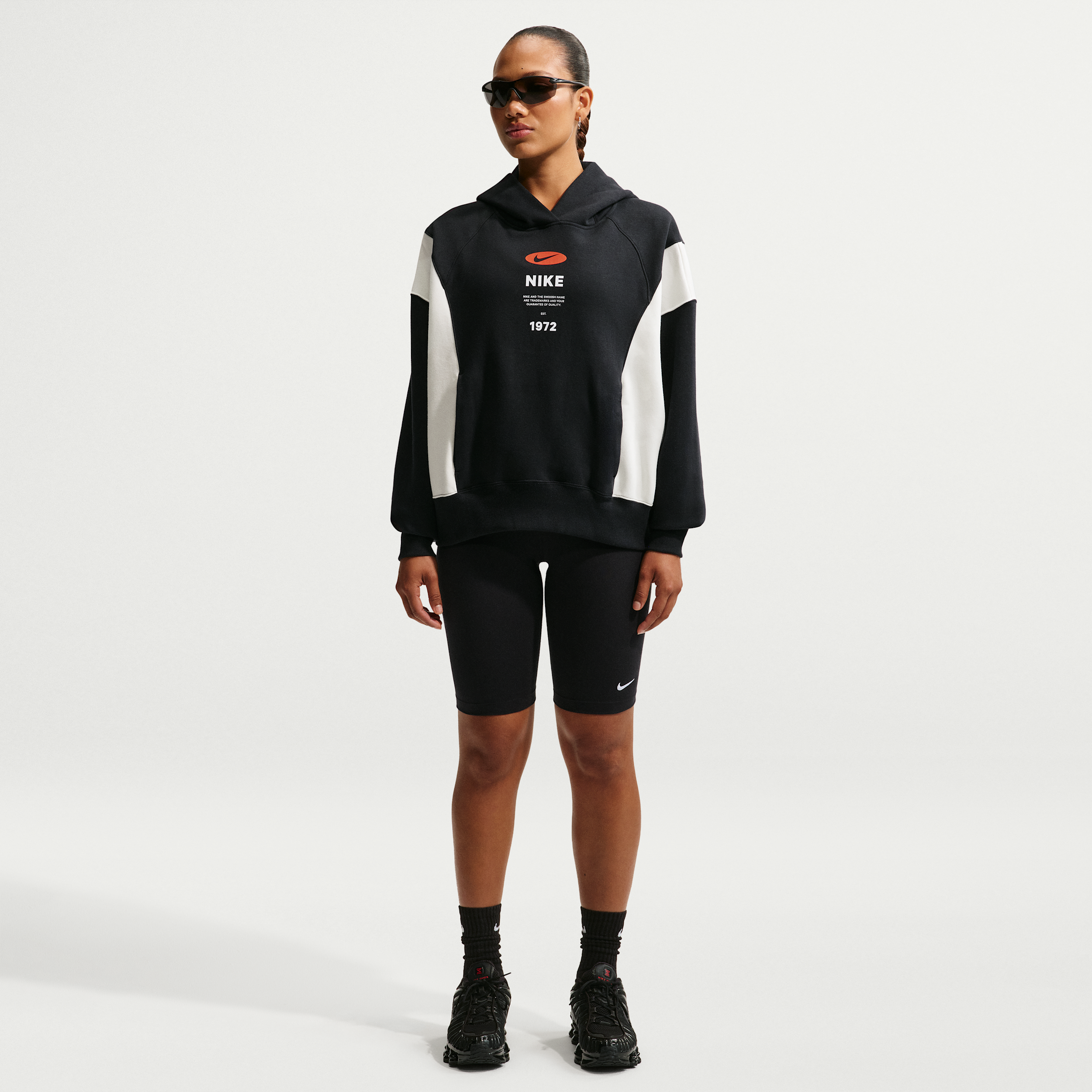 Women's Nike Sportswear Essential Mid-Rise 10" Biker Shorts in Black | CZ8526-010