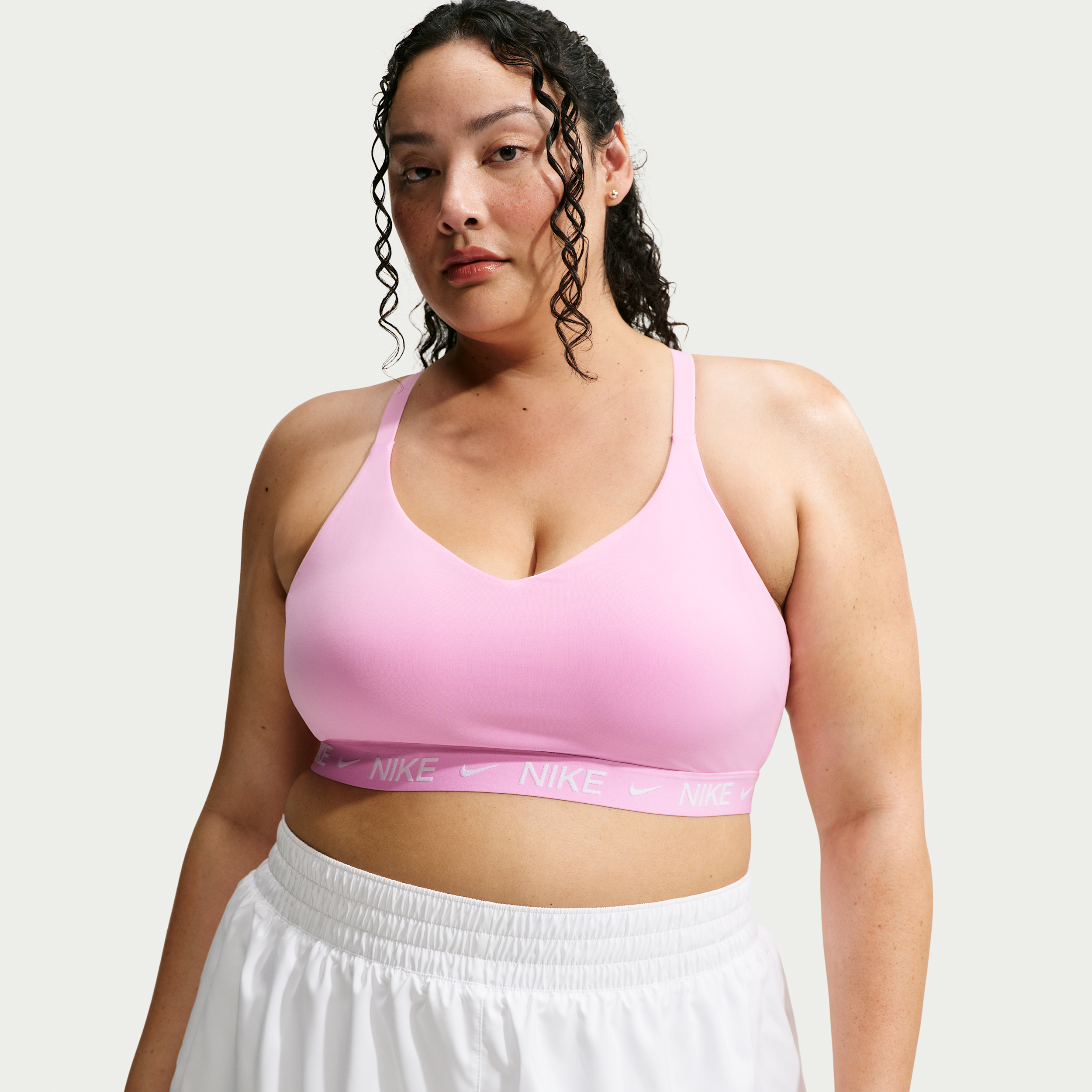 Nike Women's Indy Light Support Padded Adjustable Sports Bra (Plus Size) in Pink | FD1064-621