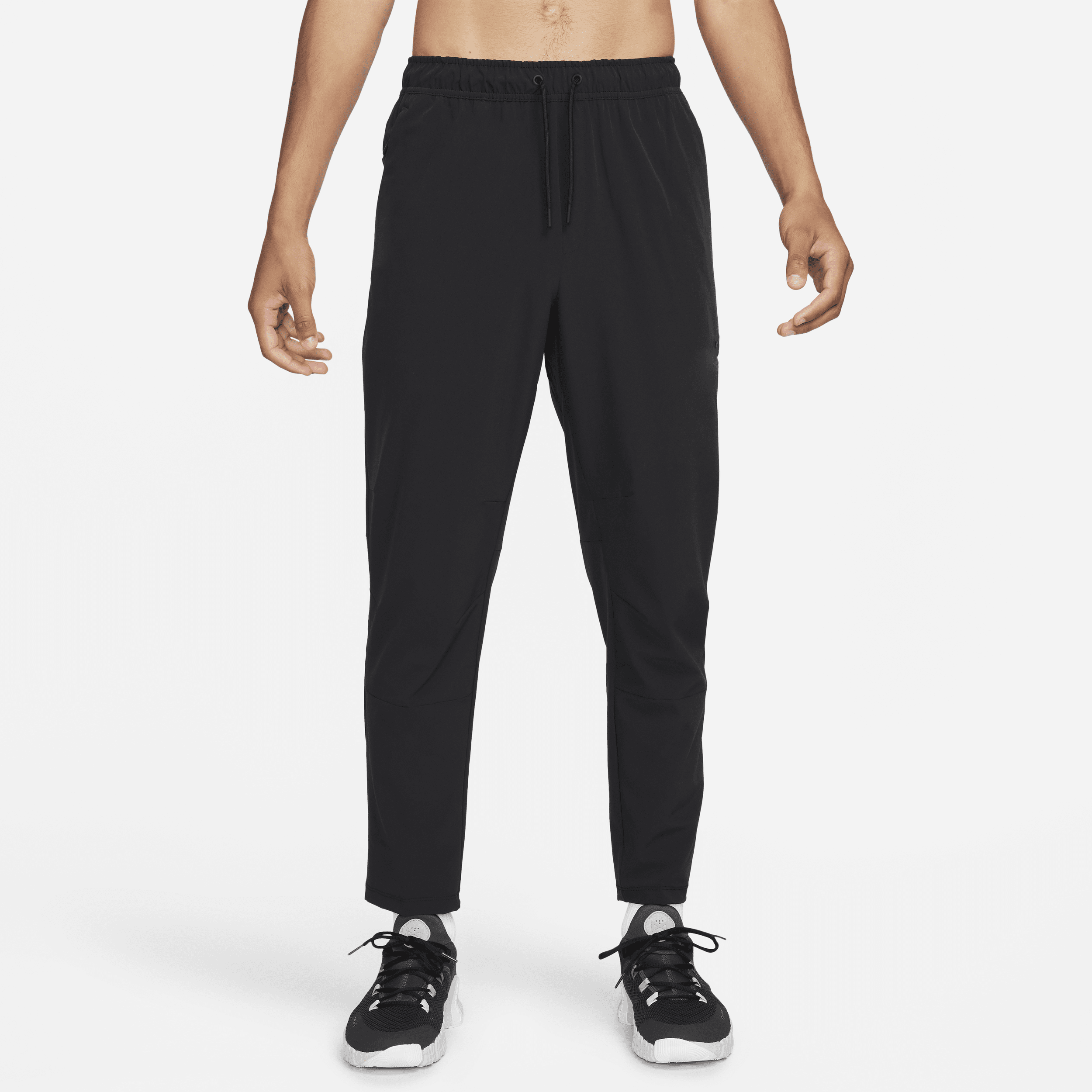 Shop Nike Men's Unlimited Dri-fit Tapered Leg Versatile Pants In Black