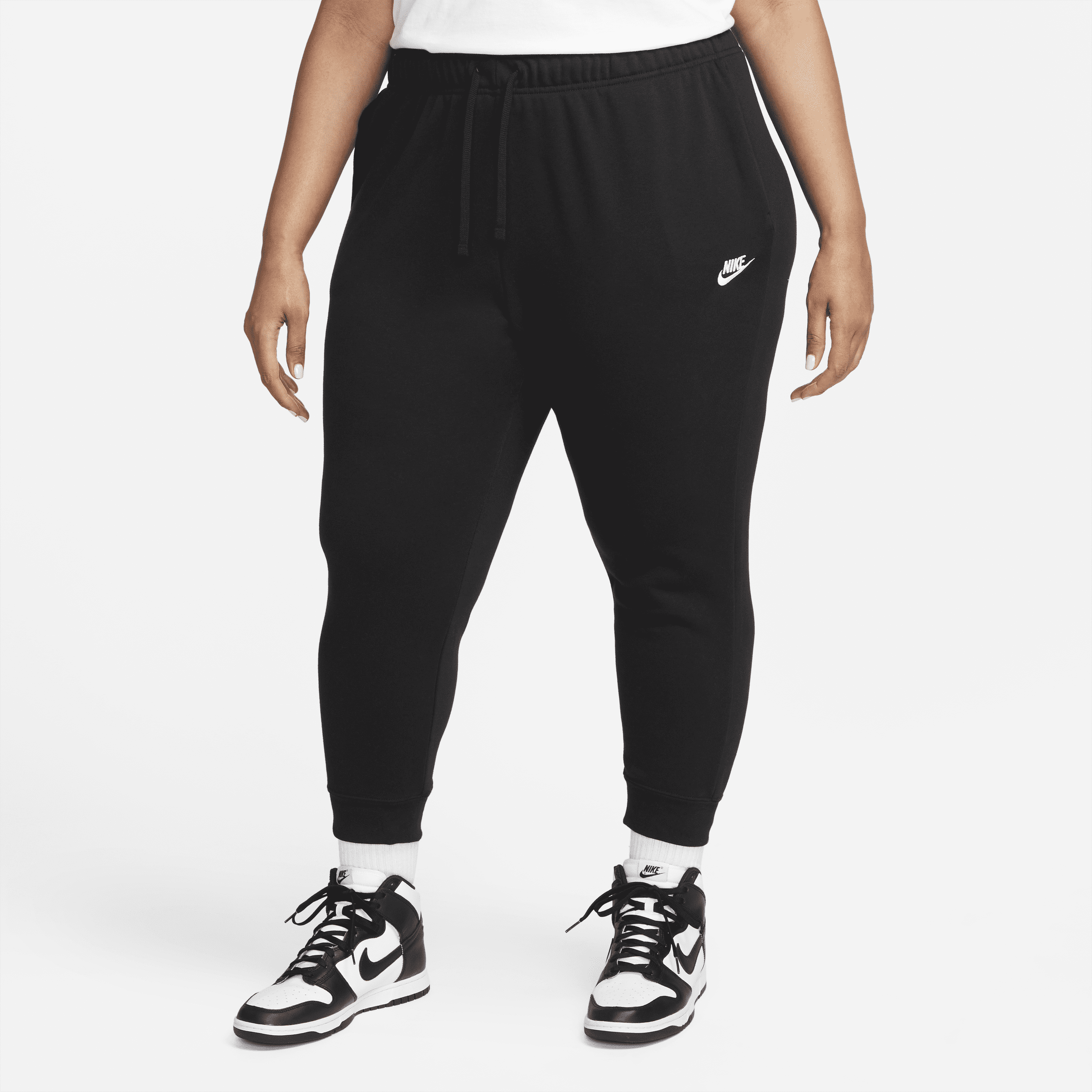 Women's Nike Sportswear Club Fleece Mid-Rise Jogger Pants (Plus Size) in Black | DV5085-010