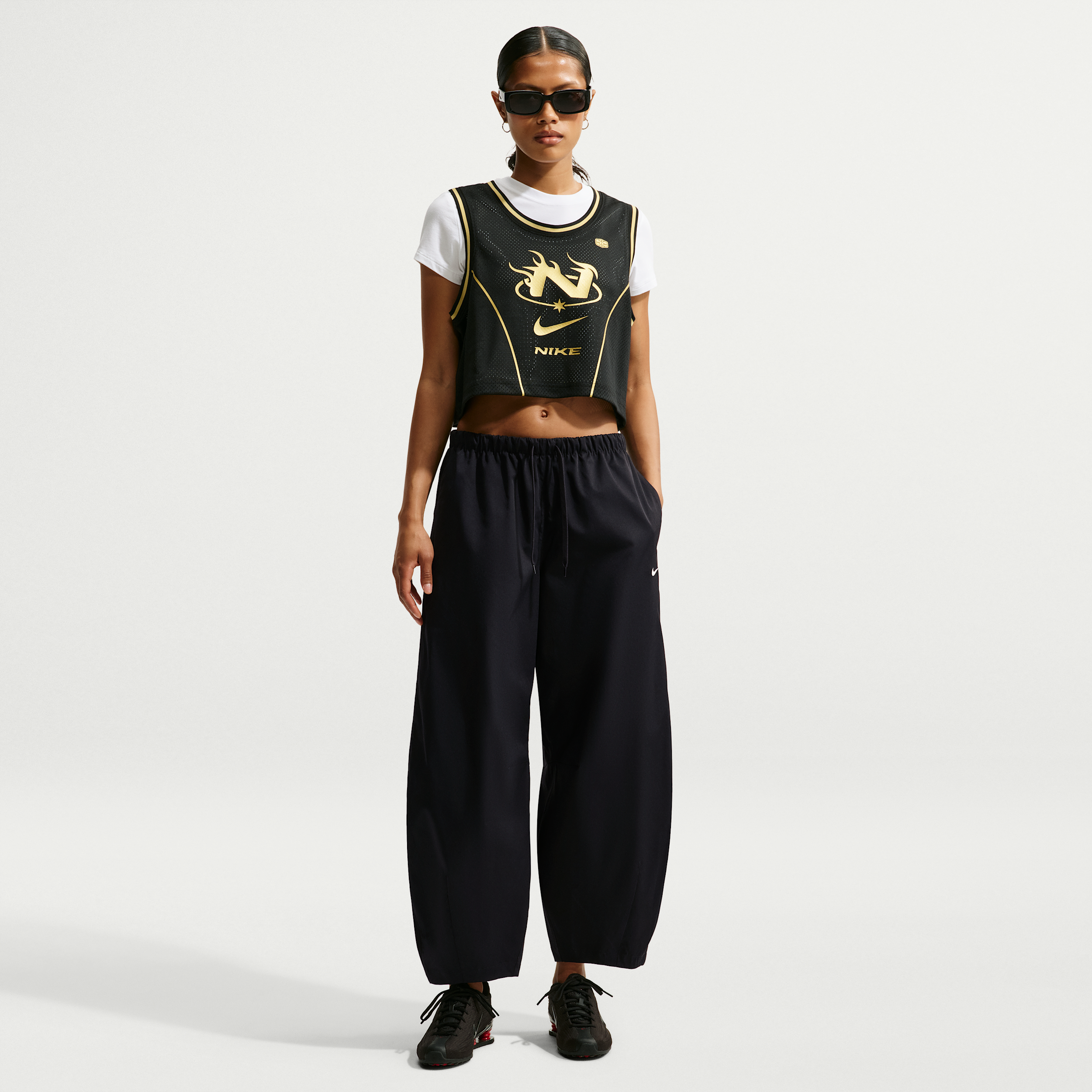 Women's Nike Sportswear Loose Mid-Rise Barrel Pants in Black | IU1981-010