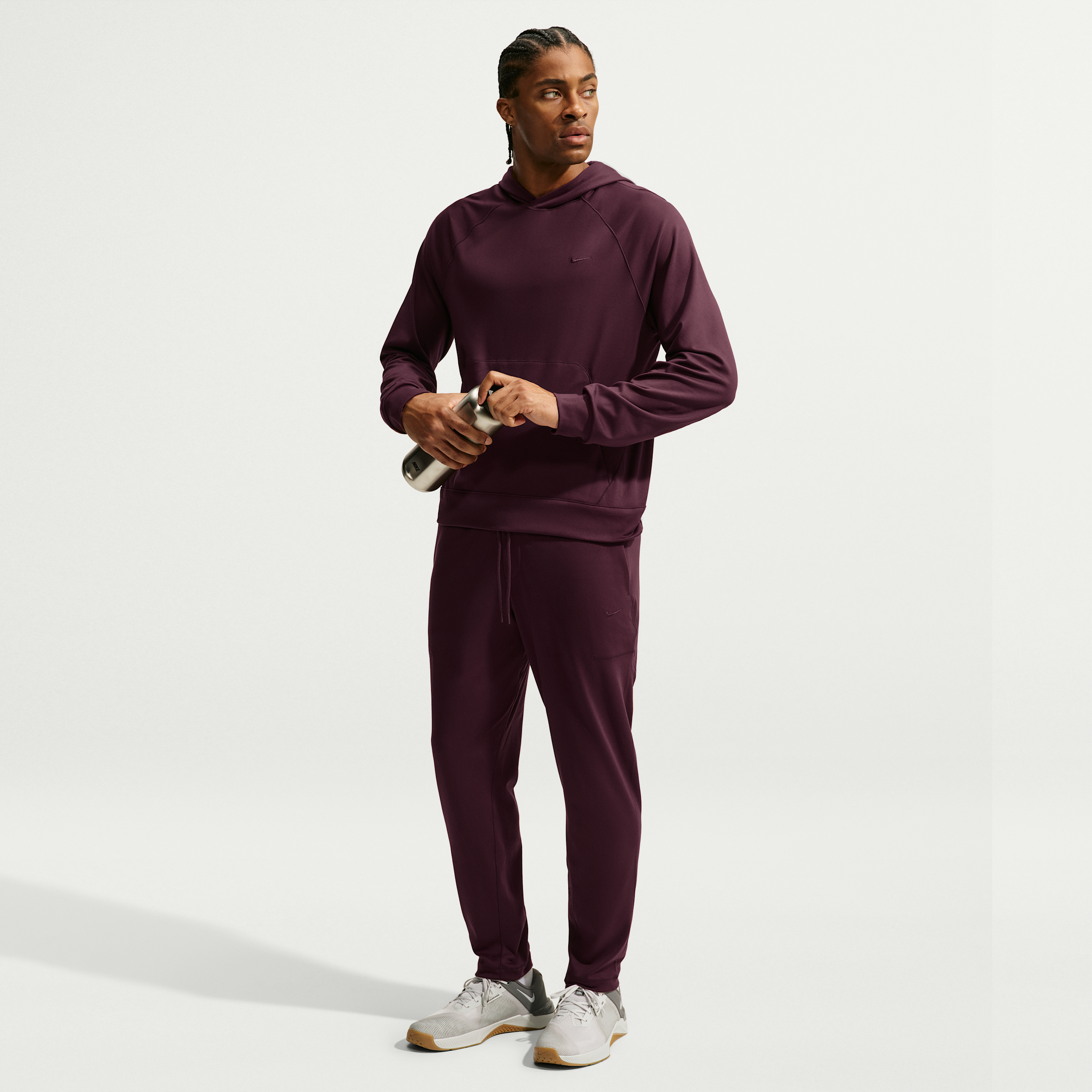 Nike Men's Primary NanoKnit Dri-FIT UV Protection Performance Pants in Red | II1306-652