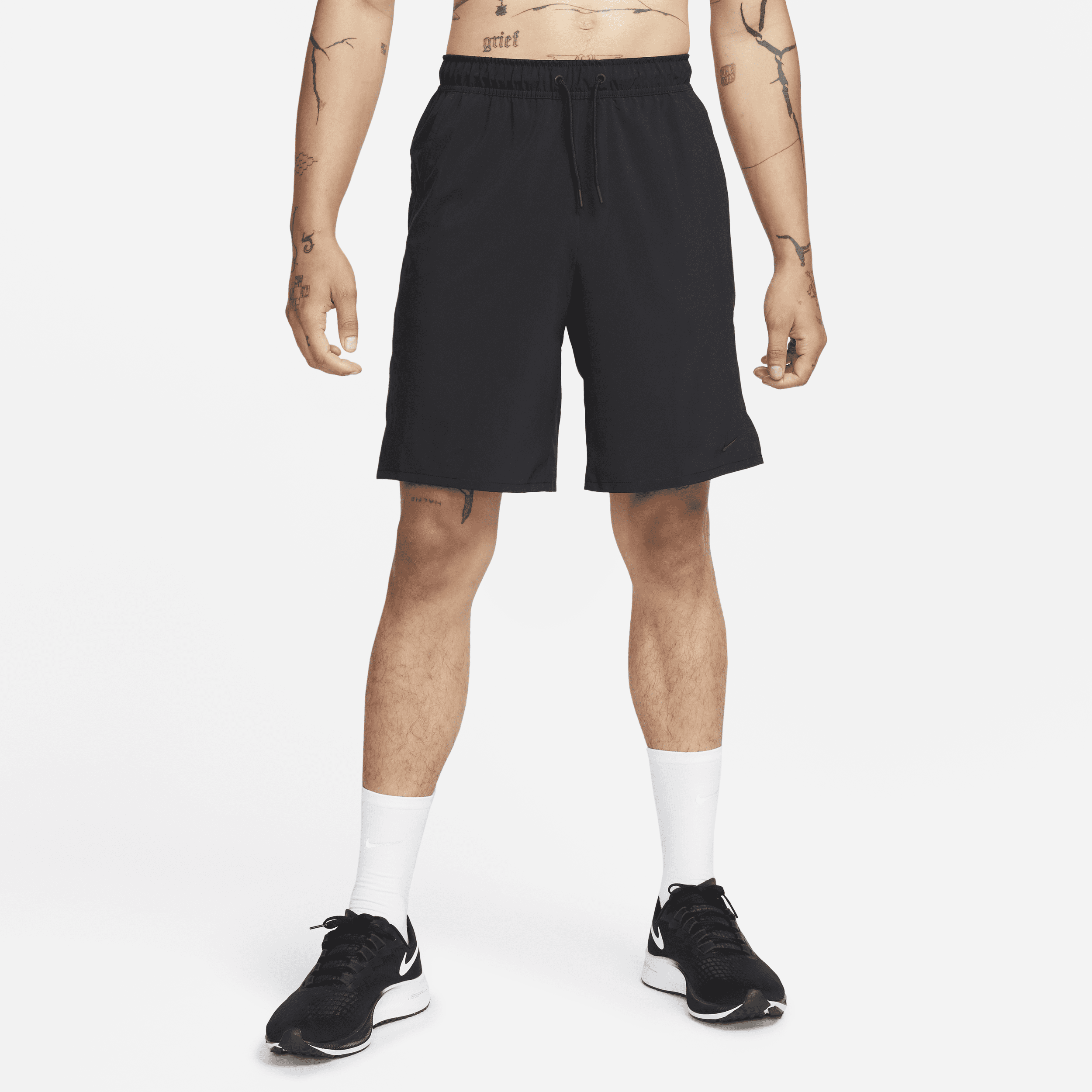 Shop Nike Men's Unlimited Dri-fit 9" Unlined Versatile Shorts In Black