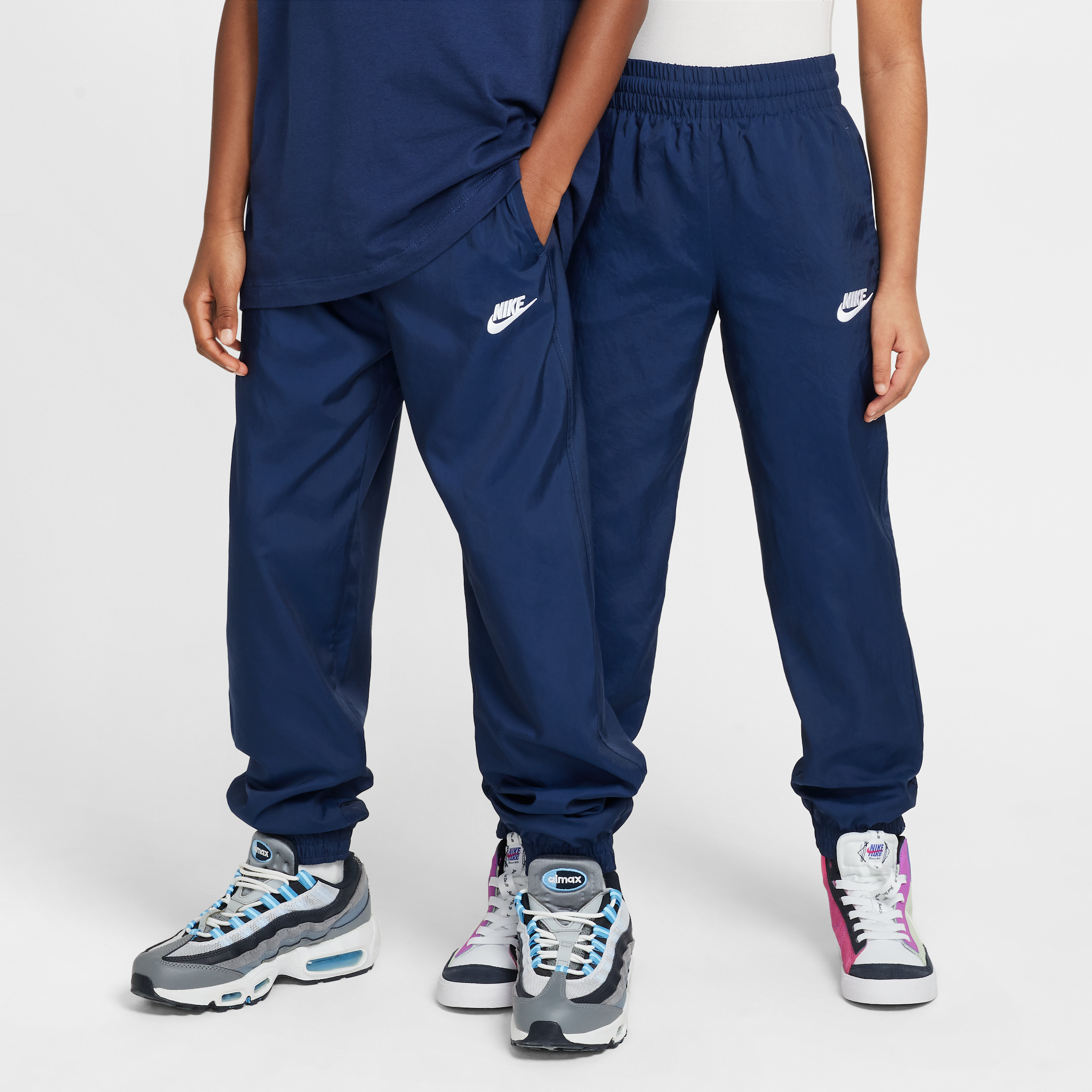 Nike Sportswear Club Big Kids' Woven Jogger Pants in Blue | HF8141-410