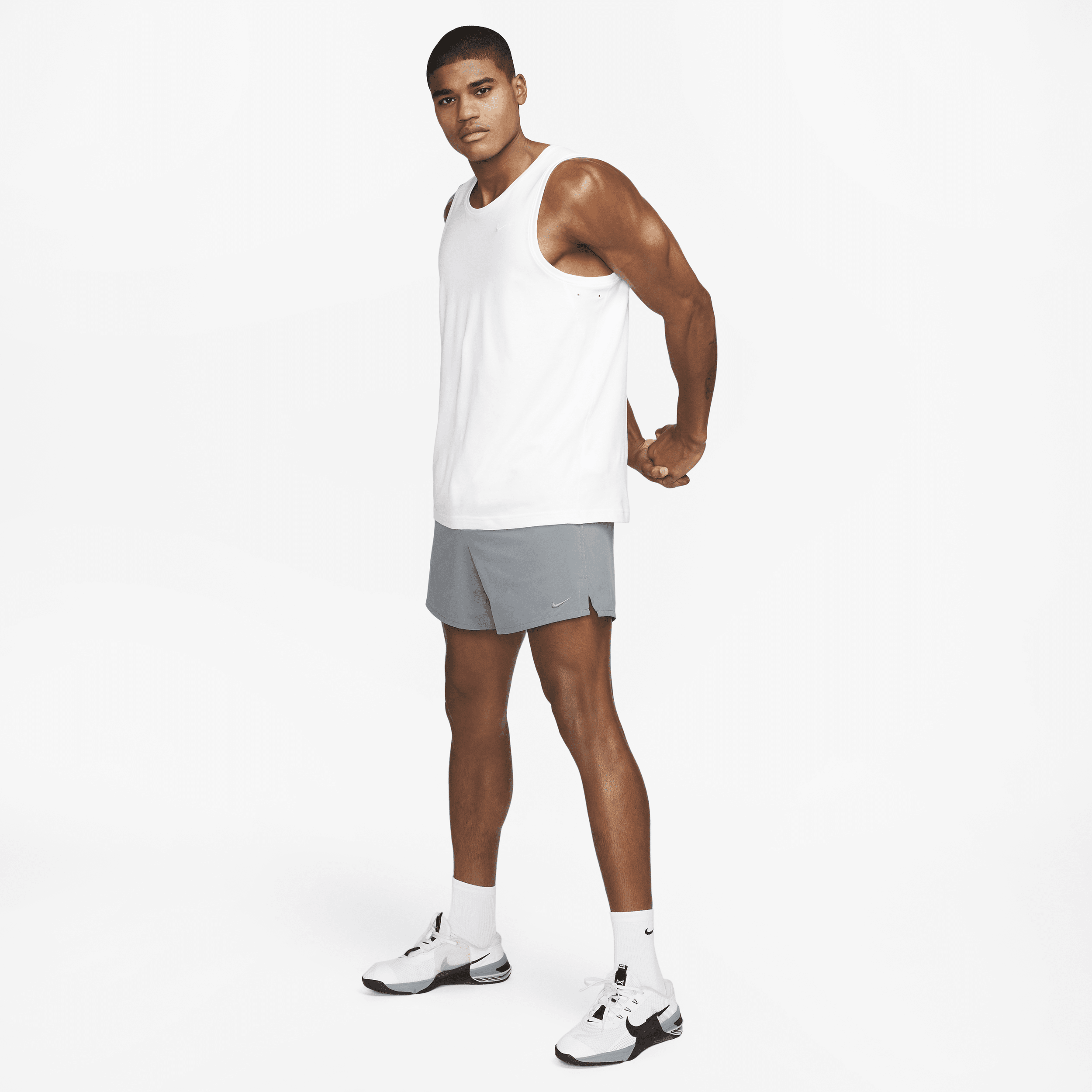 Shop Nike Men's Primary Dri-fit Versatile Tank Top In White