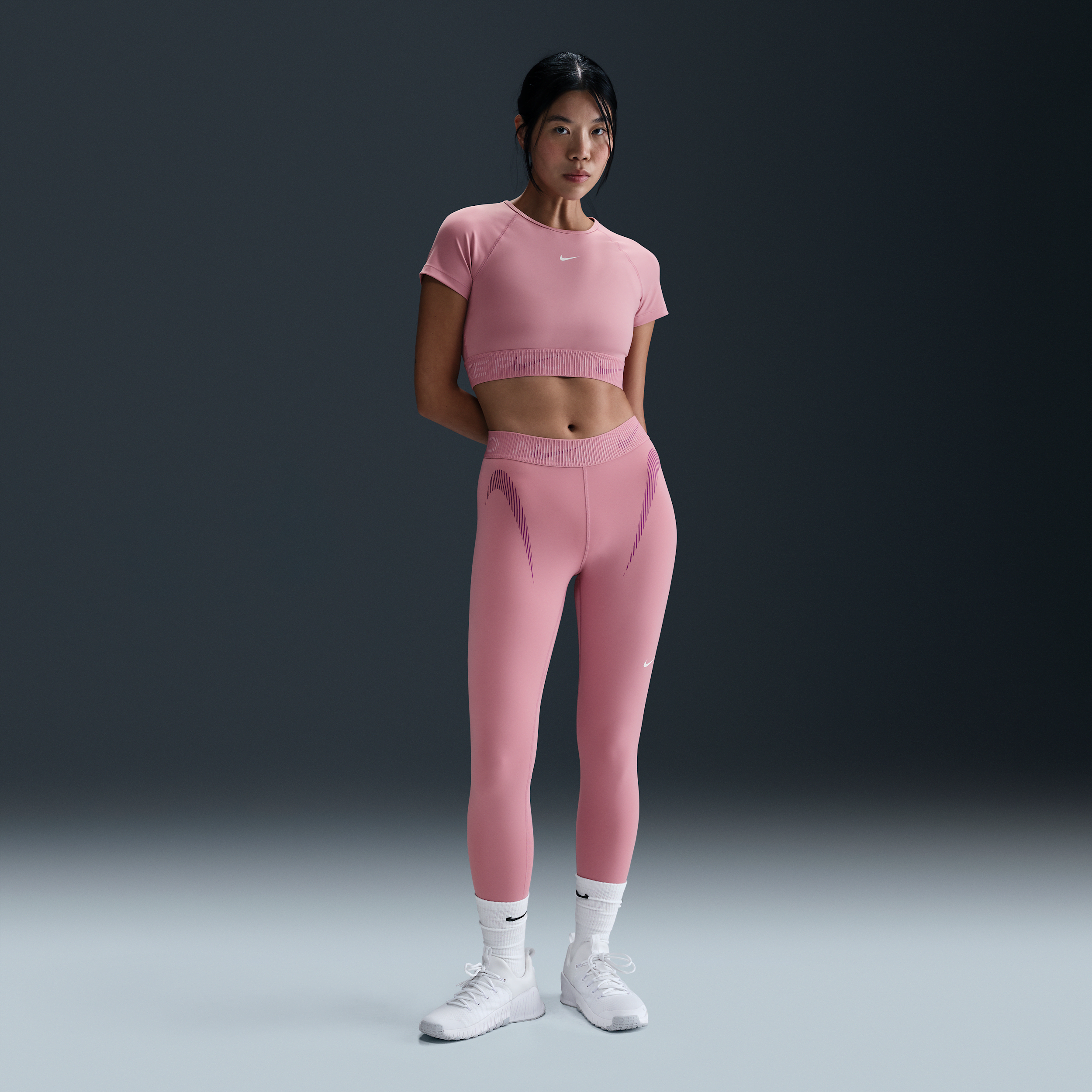 Nike Women's Pro Mid-rise 7/8 Graphic Leggings In Pink