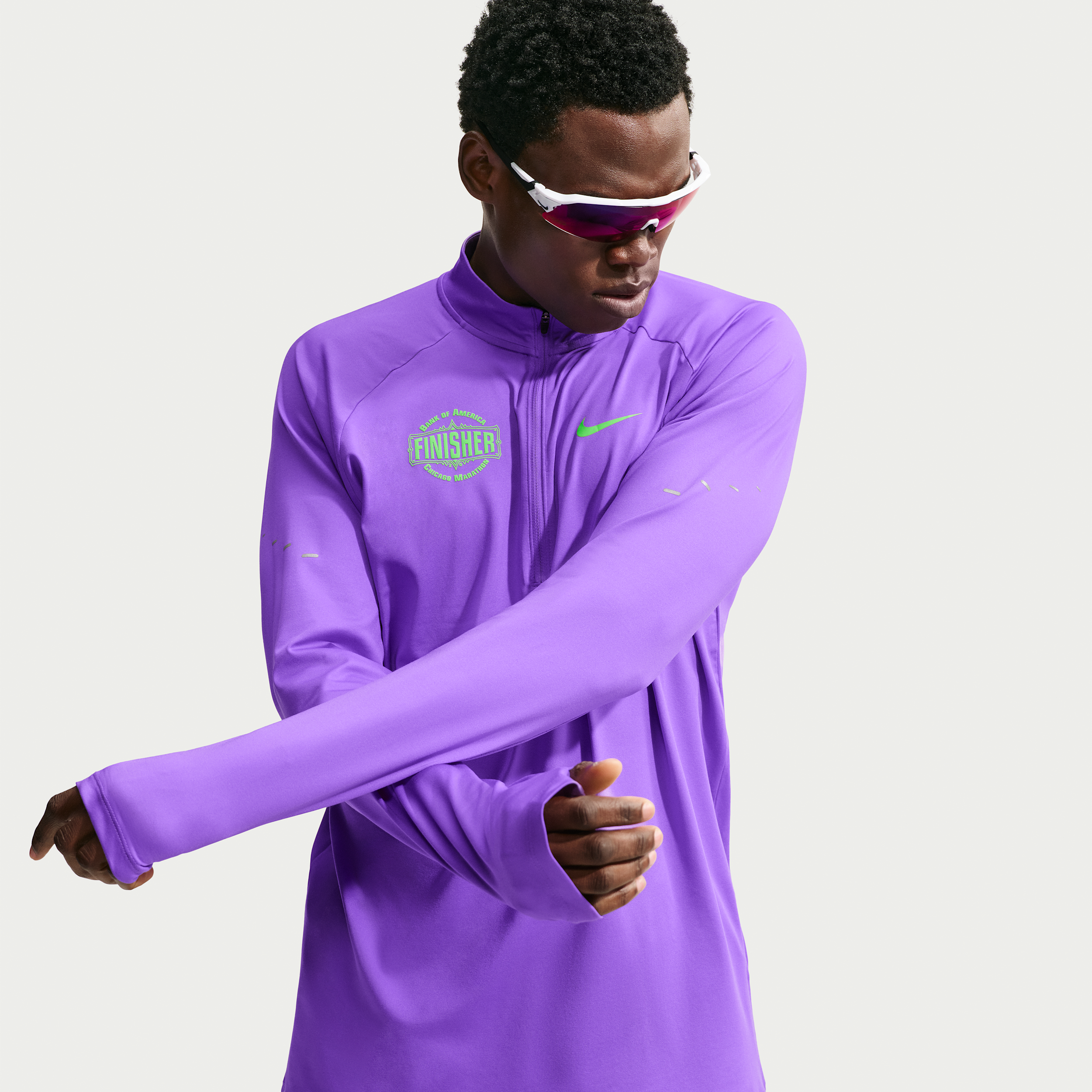 Nike Men's Stride Dri-FIT 1/2-Zip Running Top in Purple | IO8797-529
