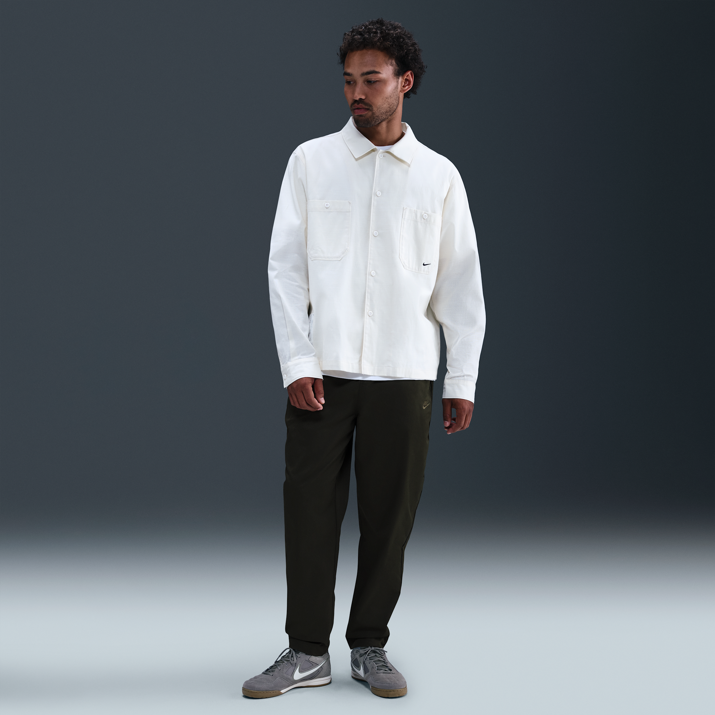 Nike Men's Club Woven Tapered Pants in Green | HJ1997-355
