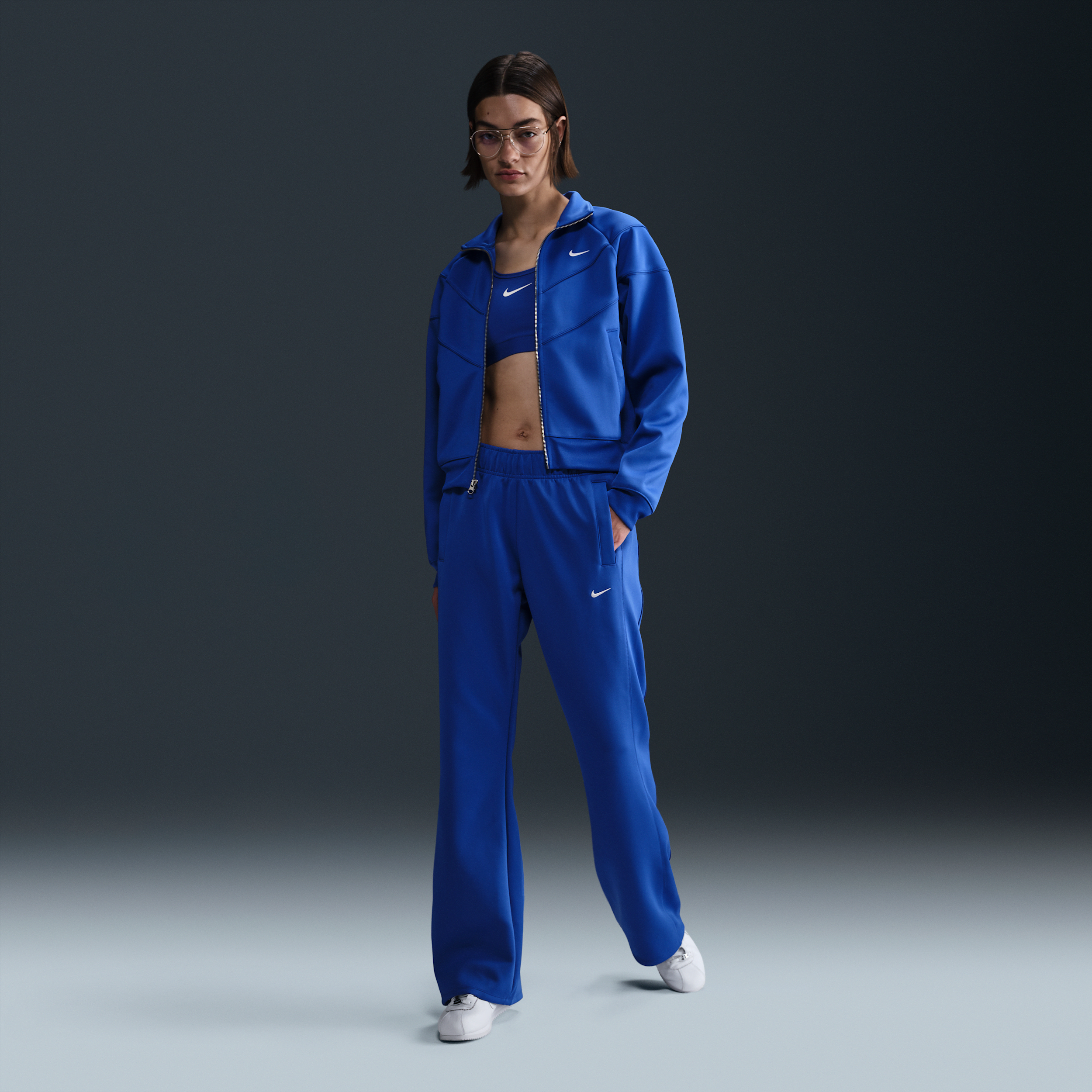 Nike Women's Sportswear Windrunner Mid-rise Slim Knit Pants In Blue