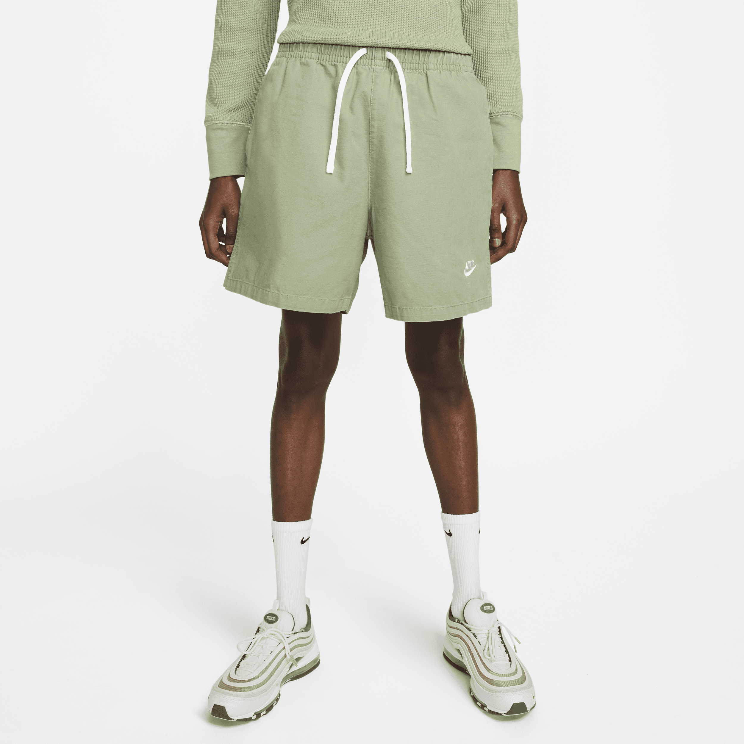 Shop Nike Men's Club Woven Washed Flow Shorts In Green