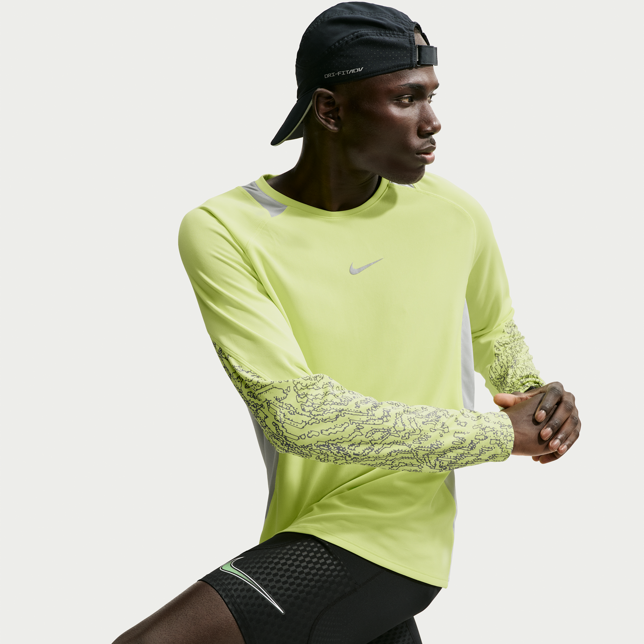 Nike Men's Stride Dri-FIT Winterized Long-Sleeve Running Top in Yellow | IO1235-736