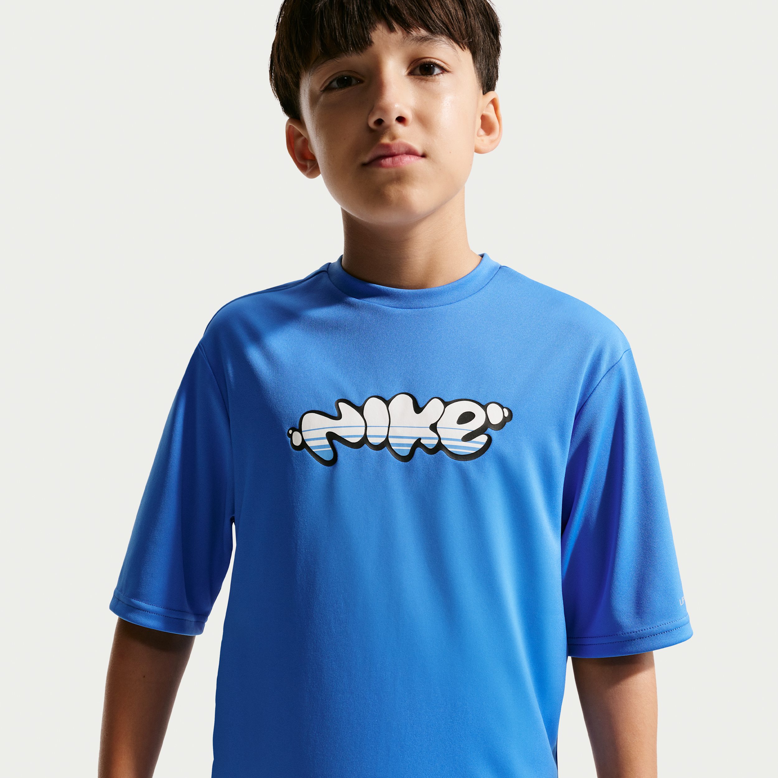 Nike Swim Hydroguard Big Kids' (Boys') Dri-FIT UV Short Sleeve Top in Blue | NESSG831-434