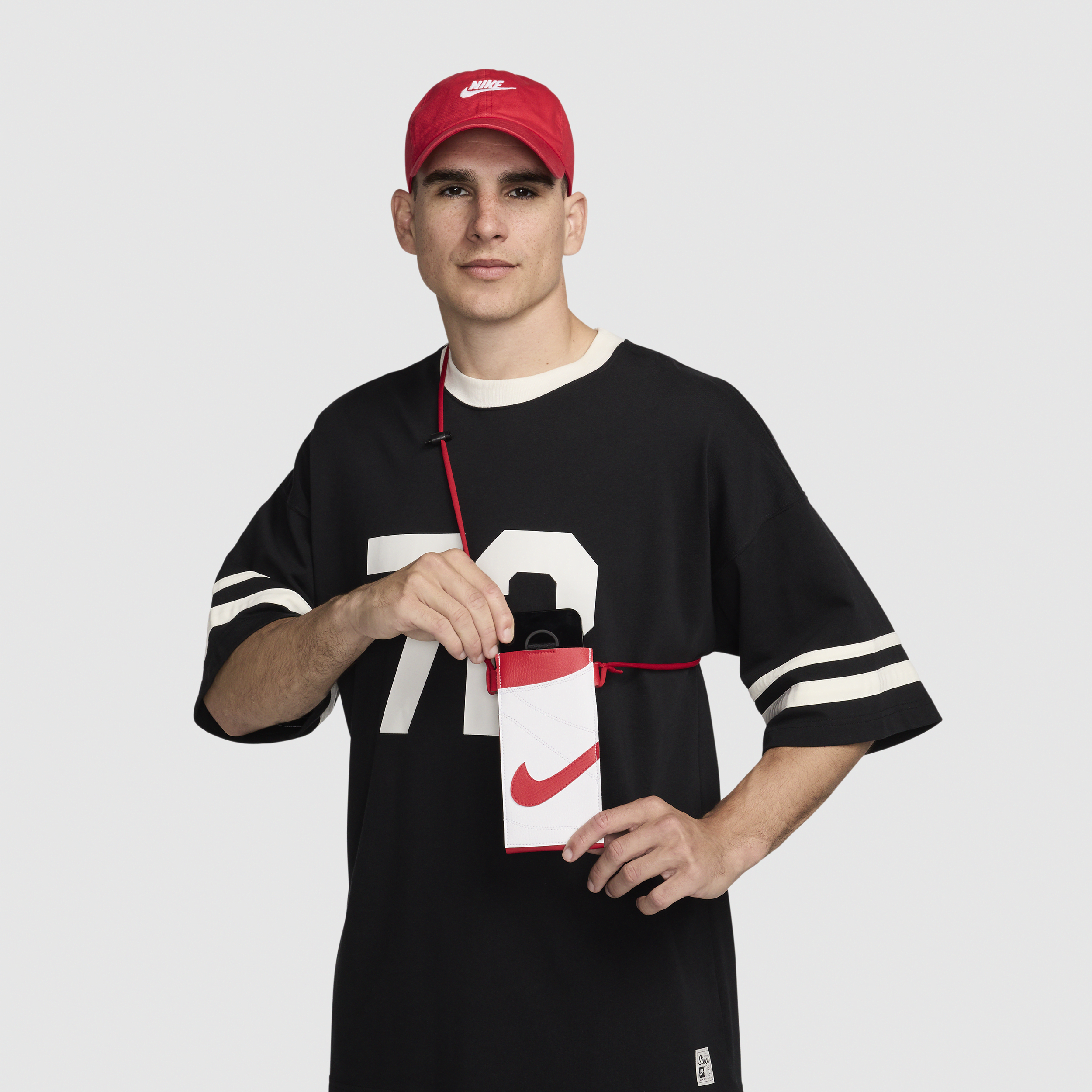 Shop Nike Unisex Premium Phone Crossbody Bag In Red