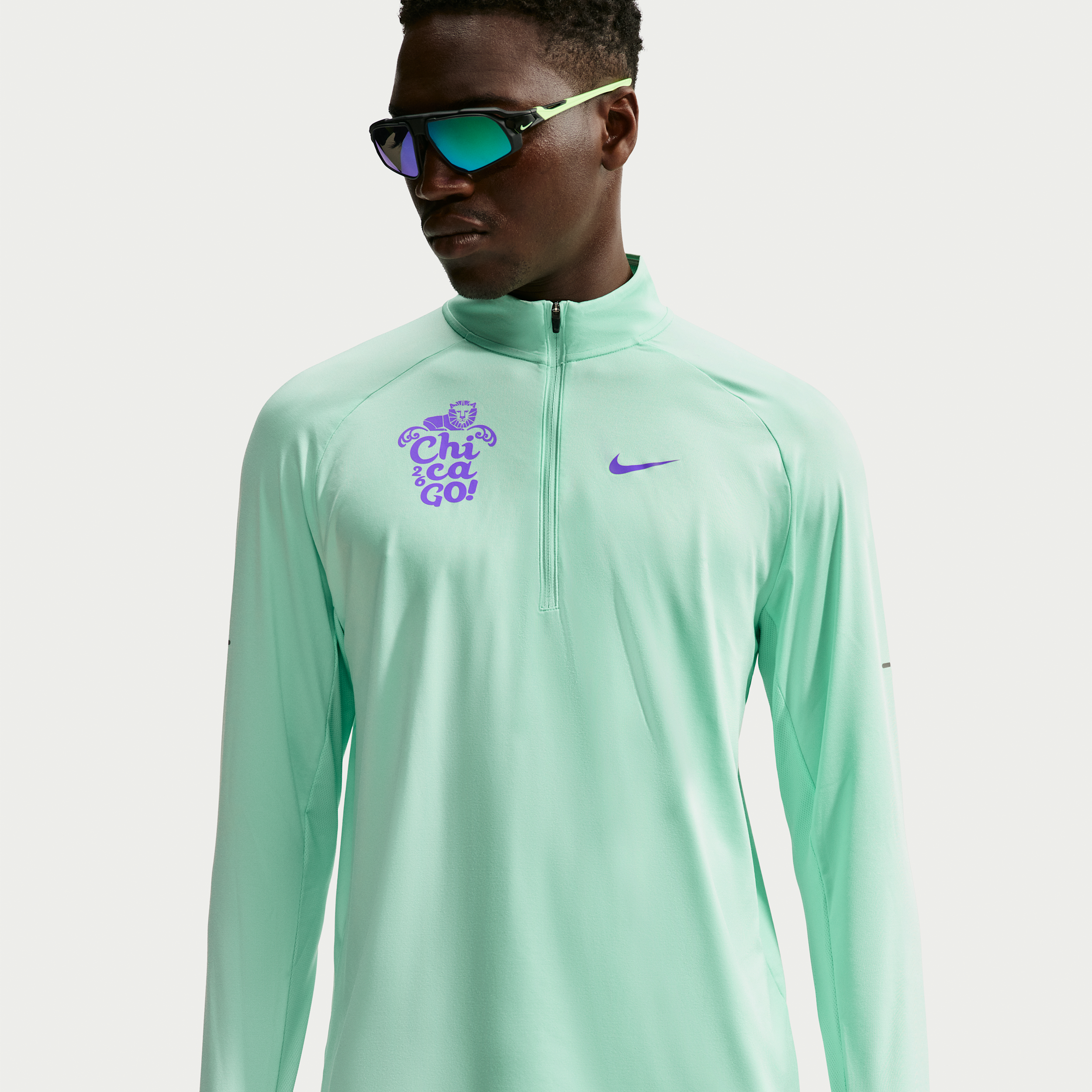 Nike Men's Stride Dri-FIT 1/2-Zip Running Top in Green | IO8798-326