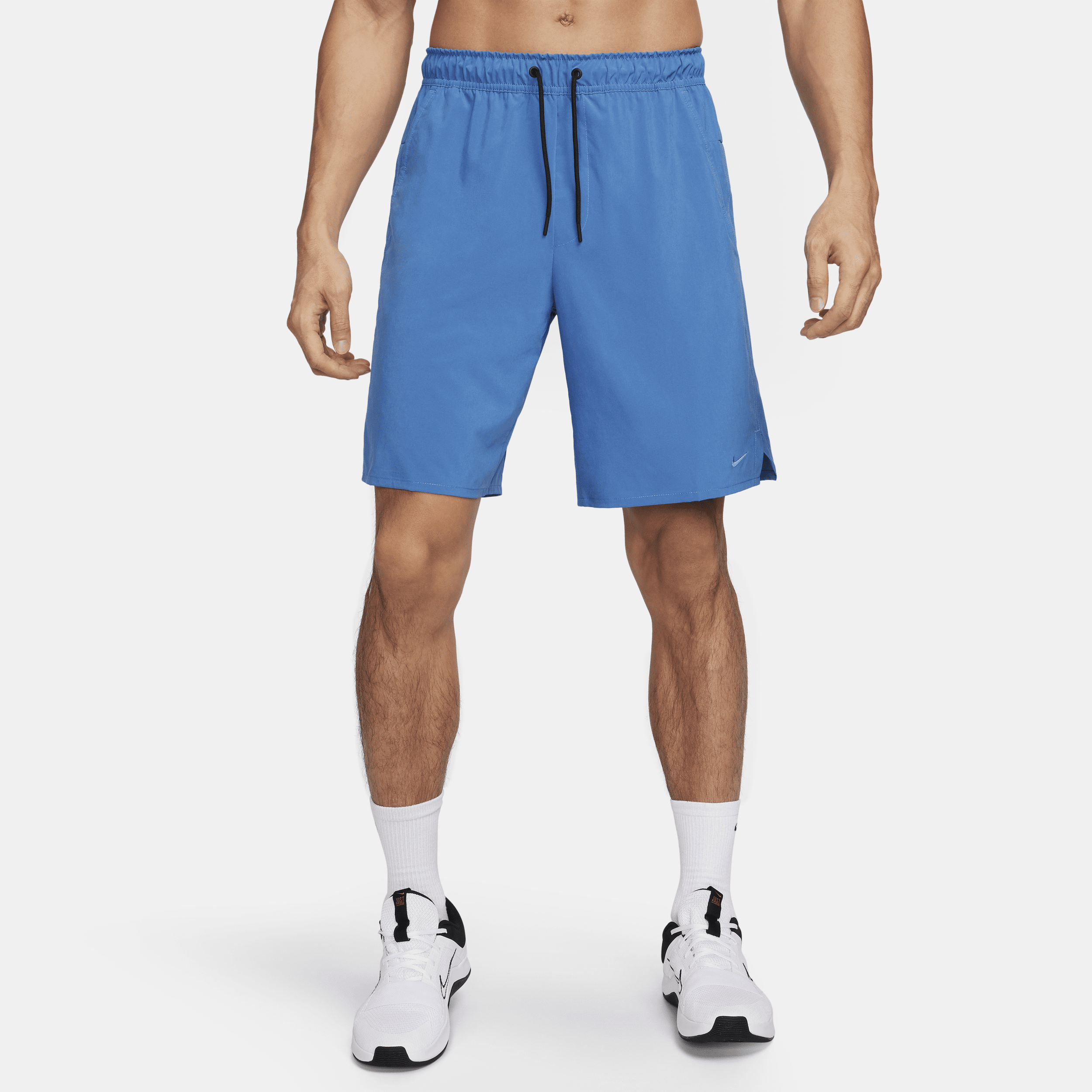 Shop Nike Men's Unlimited Dri-fit 9" Unlined Versatile Shorts In Blue
