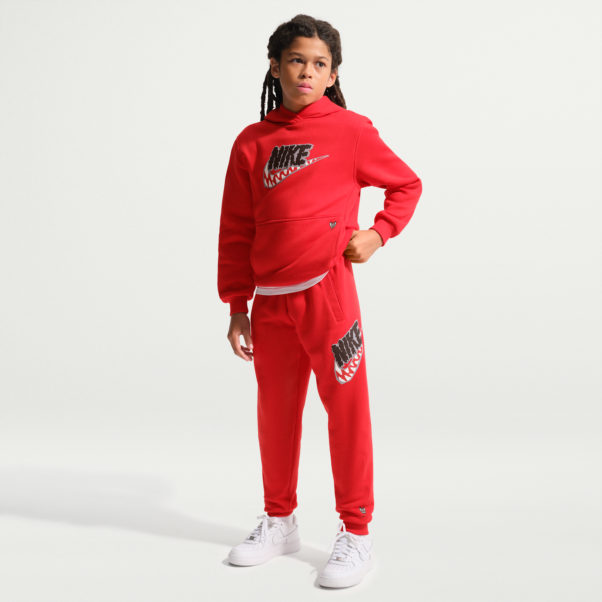Nike Sportswear Club "Werewolf" Big Kids' Fleece Jogger Pants in Red | IZ1460-657