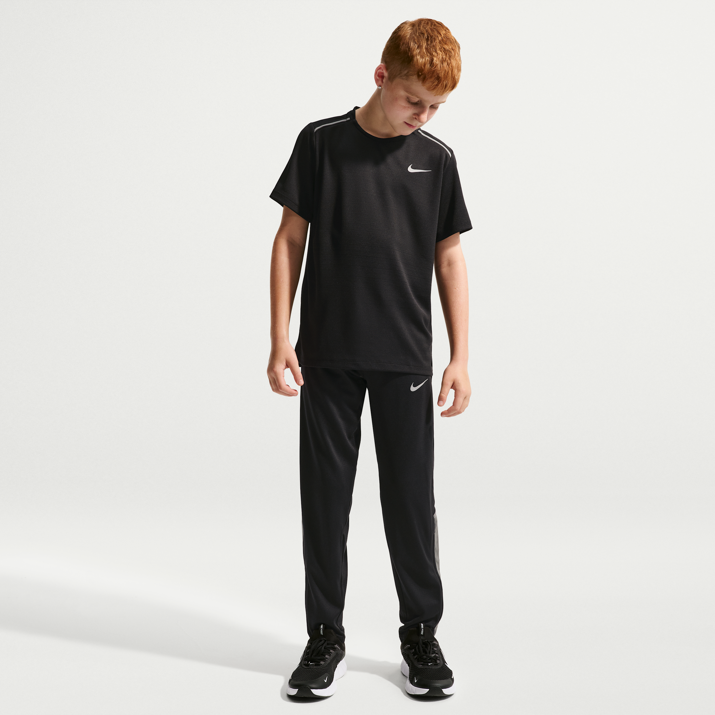 Nike Miler Big Kids' (Boys') Knit Running Pants in Black | IX7265-010
