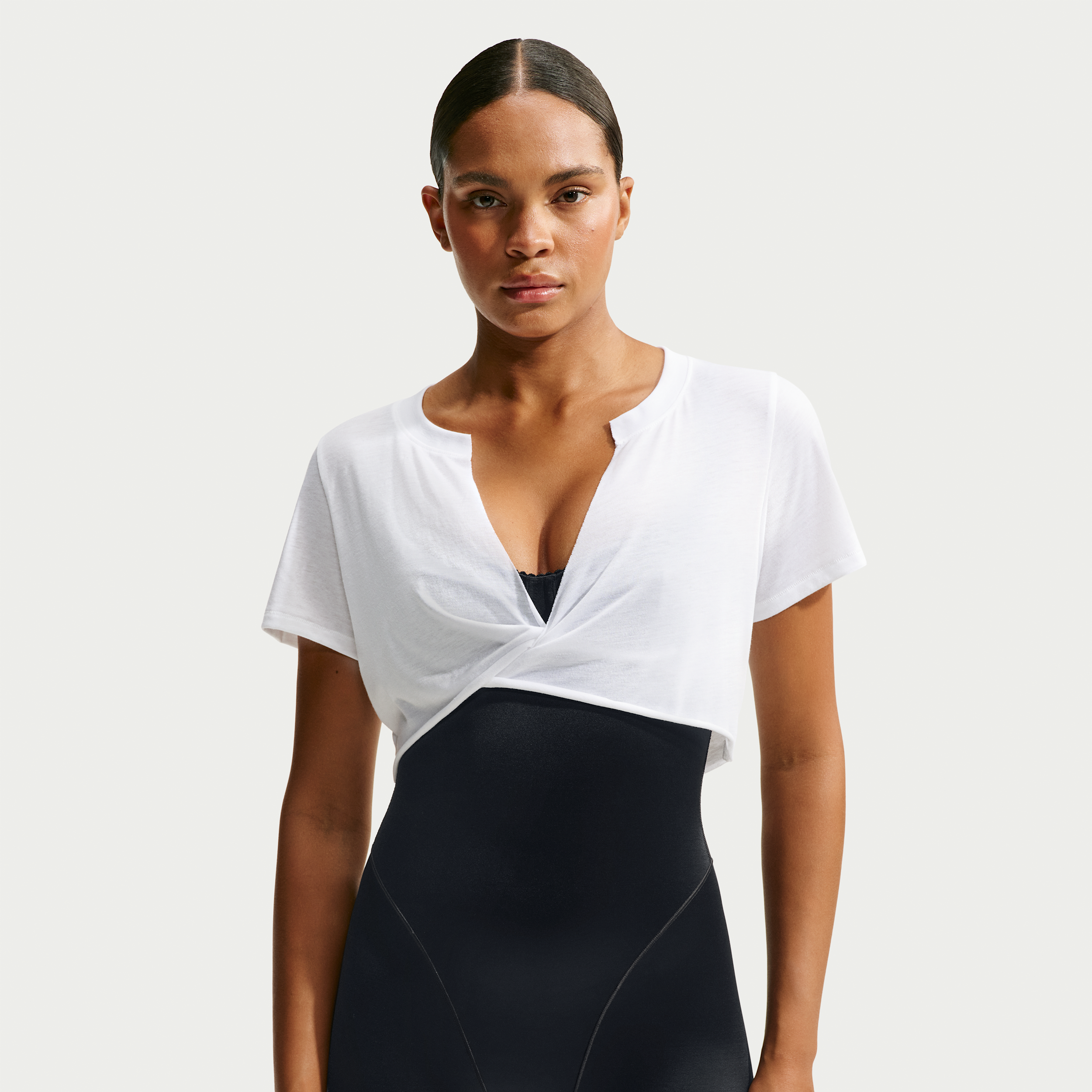 Nike Women's SKIMS Performance Cotton Blend V-Neck Cropped Twist Short-Sleeve Top in White | IV6646-125
