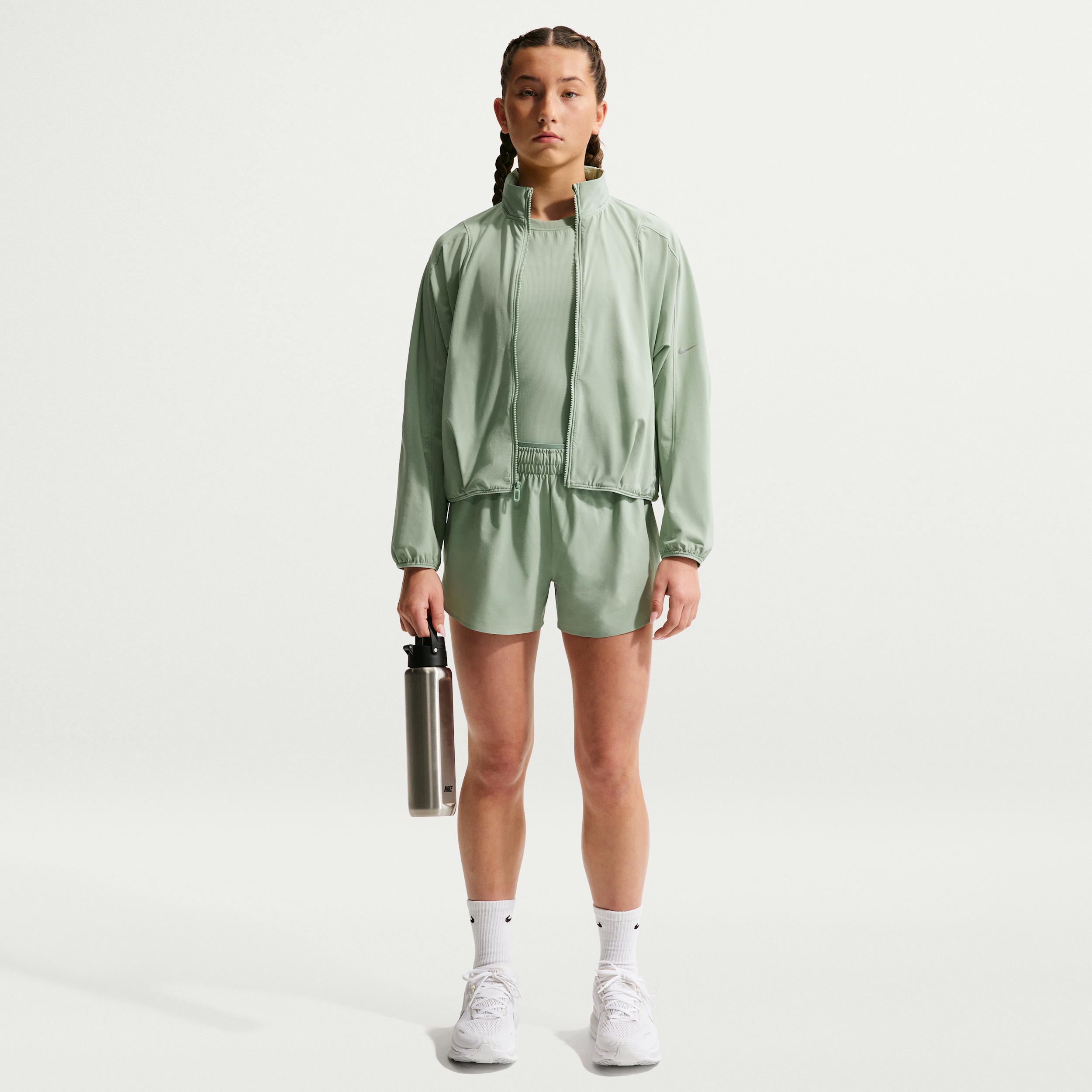 Nike Women's MAVN Girls' Dri-FIT 3" Mid-Rise Repel Running Shorts in Green | IM1768-006