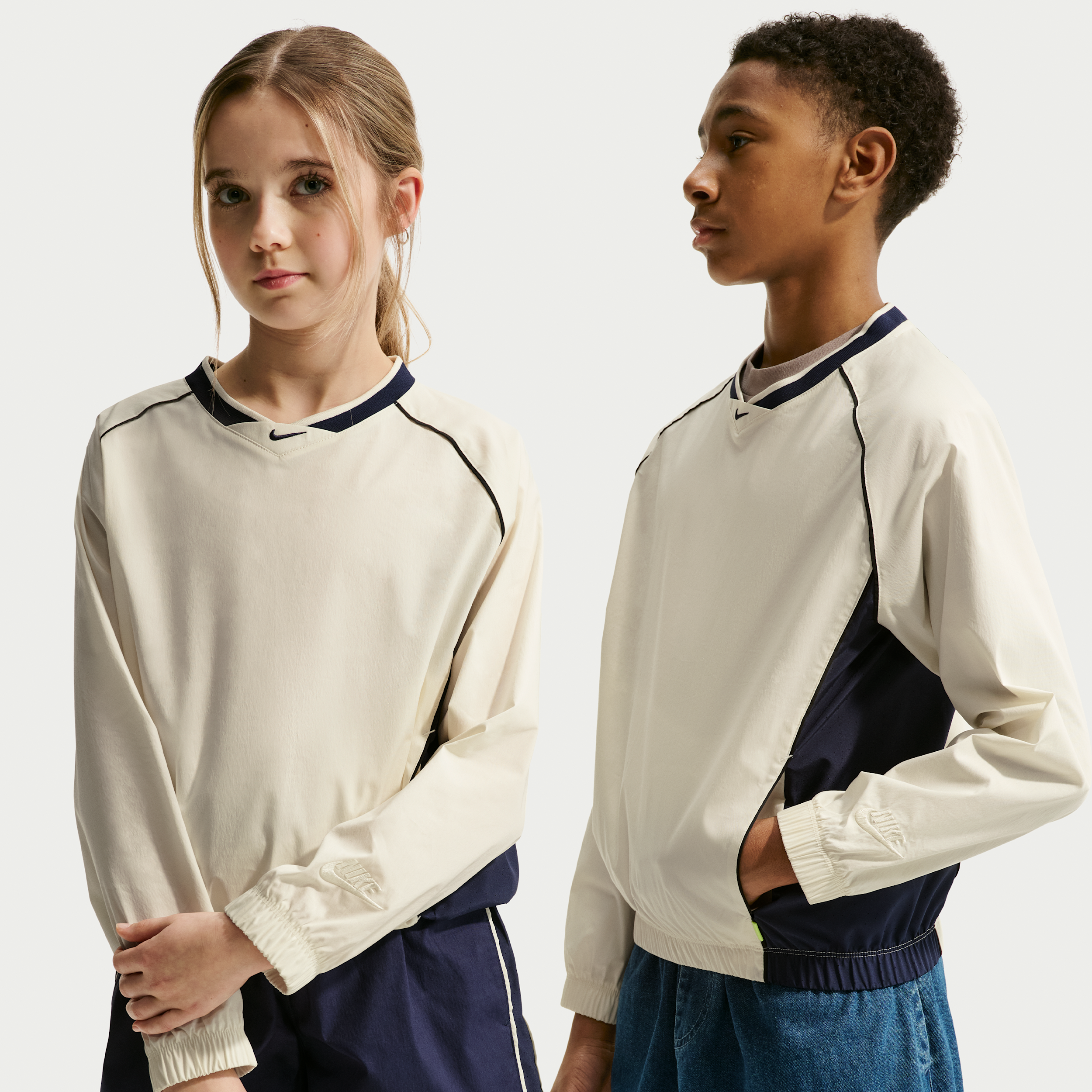 Nike Sportswear Big Kids' Woven V-Neck Long-Sleeve Top in Brown | IF2305-047
