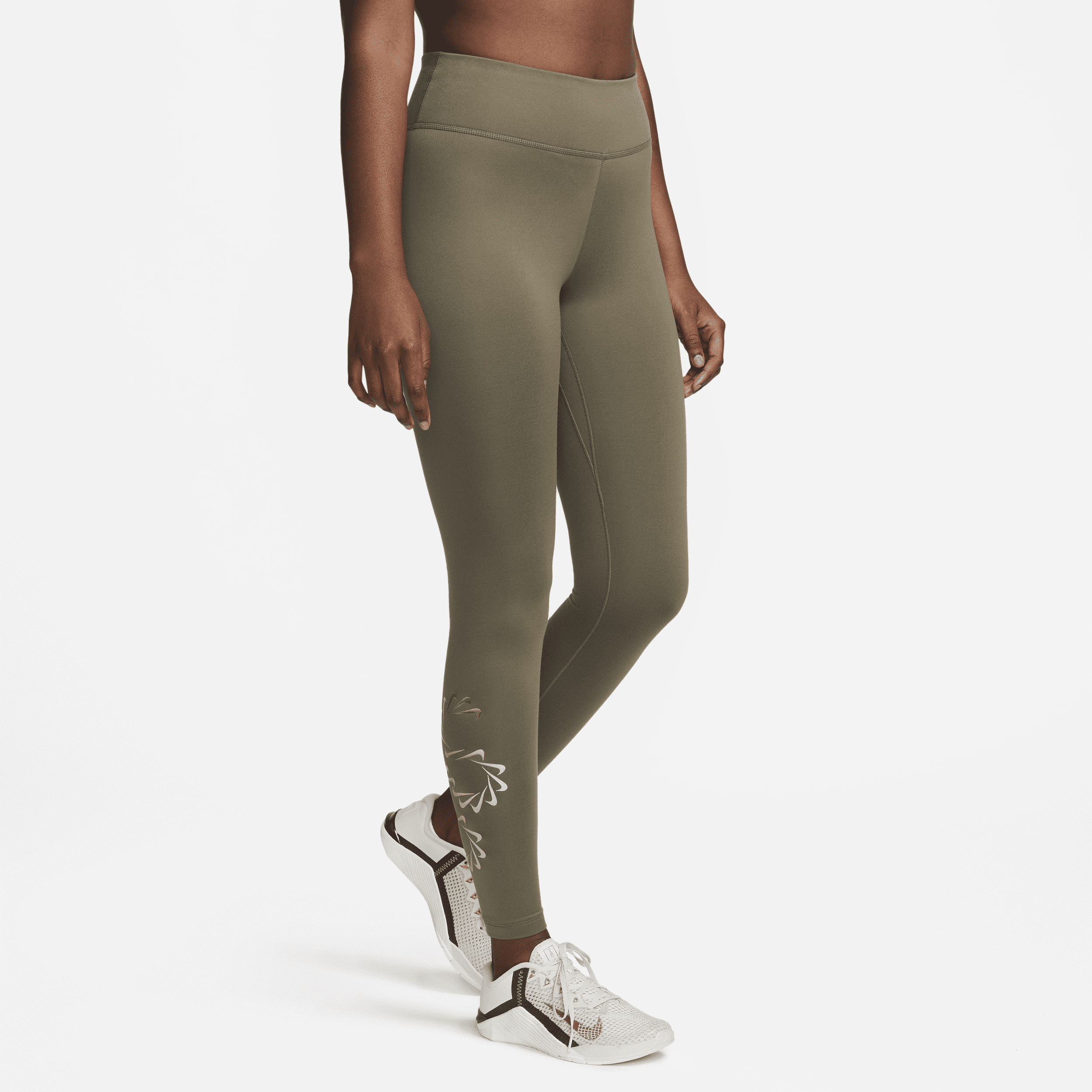 Shop Nike Women's Therma-fit One Mid-rise Graphic Training Leggings In Green