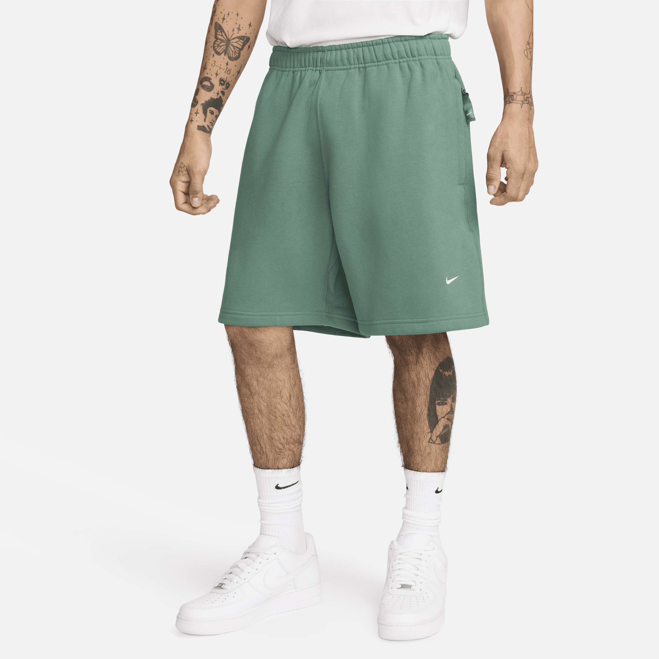 Shop Nike Men's Solo Swoosh Fleece Shorts In Green