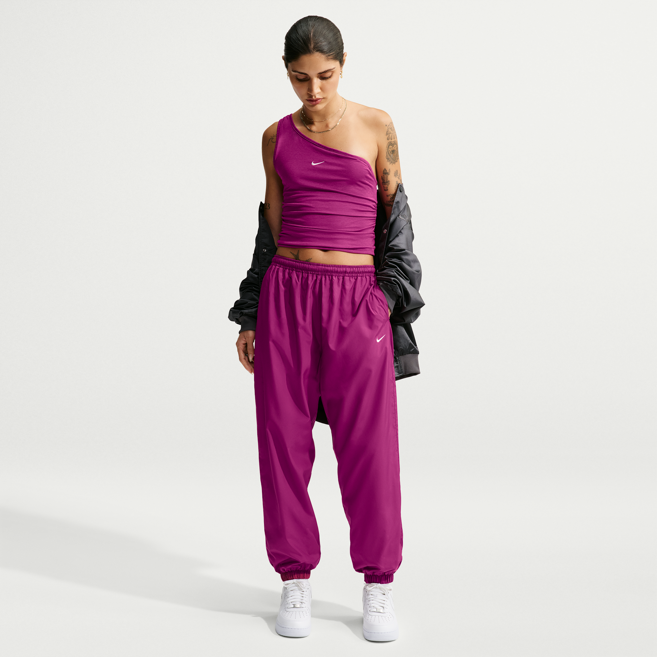 Women's Nike Sportswear Loose Mid-Rise UV Jogger Pants in Red | IM8163-630