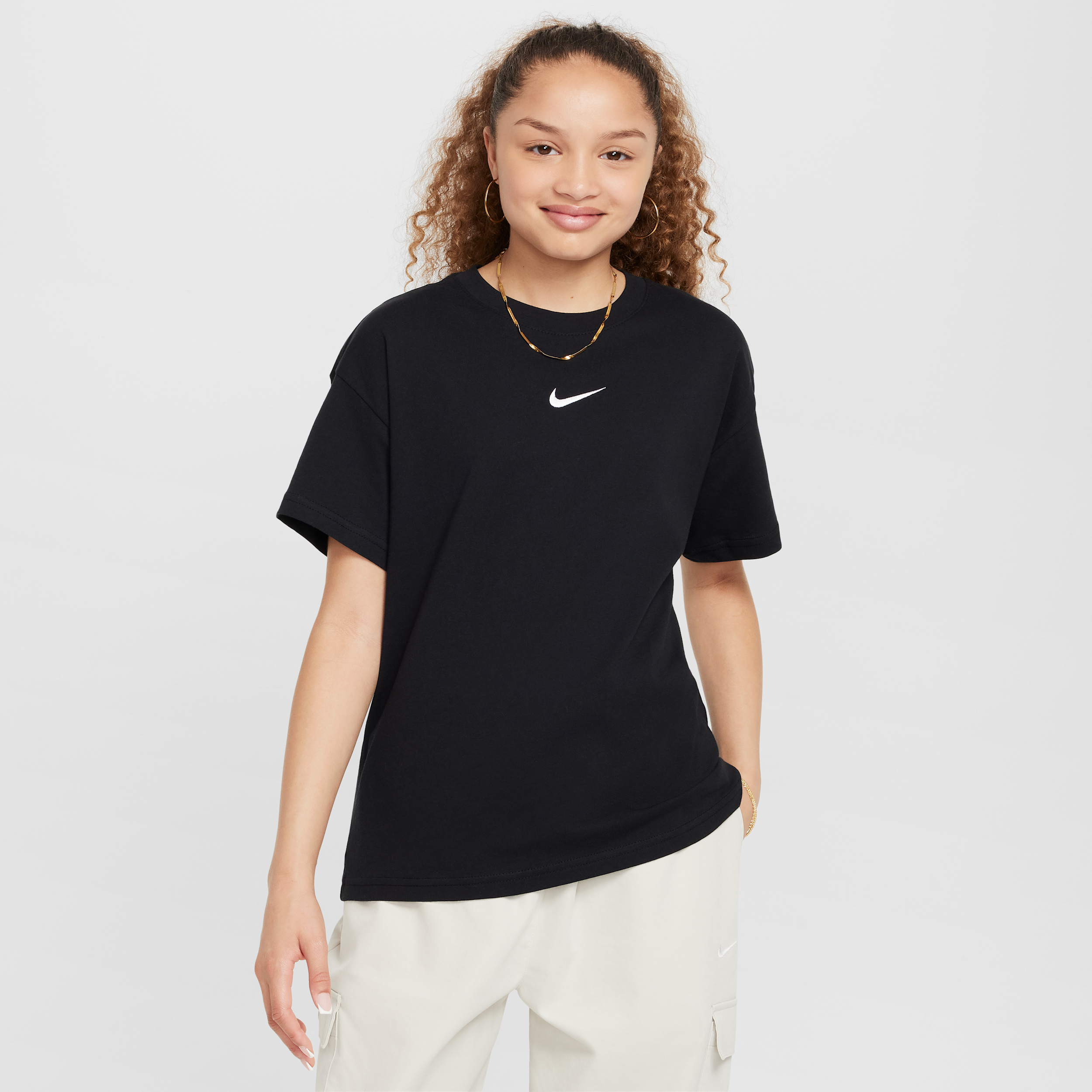 Nike Sportswear Essential Big Kids' (Girls') T-Shirt in Black | FZ5539-010